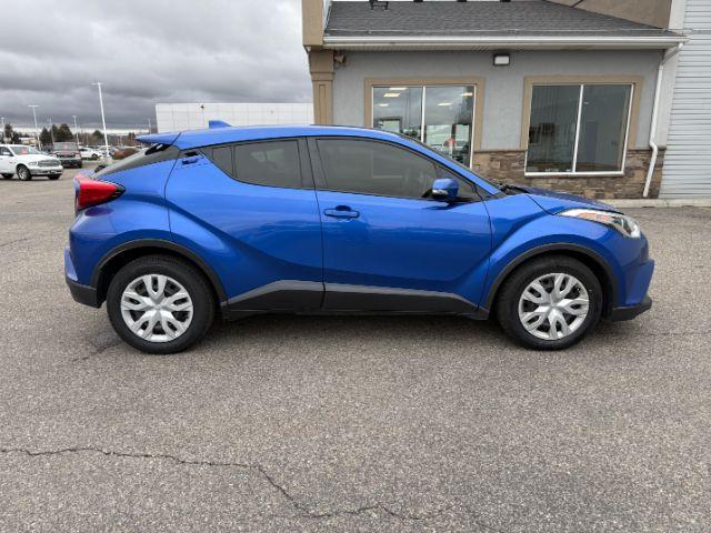 2019 BLUE /Black Toyota C-HR (JTNKHMBX4K1) with an 2L I-4 DOHC engine, Automatic transmission, located at 1175 N Woodruff Ave, Idaho Falls, ID, 83401, 43.506901, -111.999657 - This 2019 Toyota C-HR is a compact crossover built for efficient daily driving with easy maneuverability and a comfortable ride. Powered by a 2.0L 4-cylinder engine, it delivers solid fuel efficiency and dependable performance for commuting and around-town use. Its smaller footprint makes parking an- Photo#25