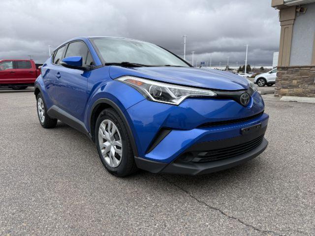 2019 BLUE /Black Toyota C-HR (JTNKHMBX4K1) with an 2L I-4 DOHC engine, Automatic transmission, located at 1175 N Woodruff Ave, Idaho Falls, ID, 83401, 43.506901, -111.999657 - This 2019 Toyota C-HR is a compact crossover built for efficient daily driving with easy maneuverability and a comfortable ride. Powered by a 2.0L 4-cylinder engine, it delivers solid fuel efficiency and dependable performance for commuting and around-town use. Its smaller footprint makes parking an- Photo#26