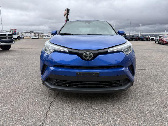 2019 BLUE /Black Toyota C-HR (JTNKHMBX4K1) with an 2L I-4 DOHC engine, Automatic transmission, located at 1175 N Woodruff Ave, Idaho Falls, ID, 83401, 43.506901, -111.999657 - This 2019 Toyota C-HR is a compact crossover built for efficient daily driving with easy maneuverability and a comfortable ride. Powered by a 2.0L 4-cylinder engine, it delivers solid fuel efficiency and dependable performance for commuting and around-town use. Its smaller footprint makes parking an- Photo#27