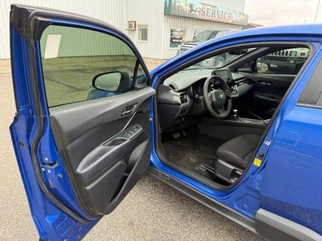 2019 BLUE /Black Toyota C-HR (JTNKHMBX4K1) with an 2L I-4 DOHC engine, Automatic transmission, located at 1175 N Woodruff Ave, Idaho Falls, ID, 83401, 43.506901, -111.999657 - This 2019 Toyota C-HR is a compact crossover built for efficient daily driving with easy maneuverability and a comfortable ride. Powered by a 2.0L 4-cylinder engine, it delivers solid fuel efficiency and dependable performance for commuting and around-town use. Its smaller footprint makes parking an- Photo#29