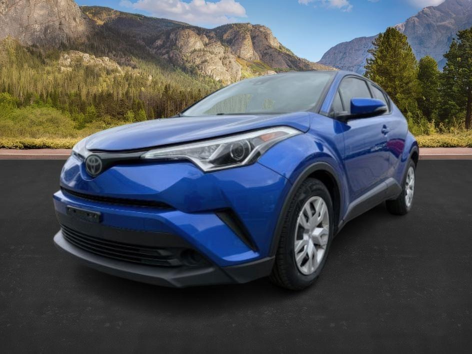 2019 BLUE /Black Toyota C-HR (JTNKHMBX4K1) with an 2L I-4 DOHC engine, Automatic transmission, located at 1175 N Woodruff Ave, Idaho Falls, ID, 83401, 43.506901, -111.999657 - This 2019 Toyota C-HR is a compact crossover built for efficient daily driving with easy maneuverability and a comfortable ride. Powered by a 2.0L 4-cylinder engine, it delivers solid fuel efficiency and dependable performance for commuting and around-town use. Its smaller footprint makes parking an- Photo#0
