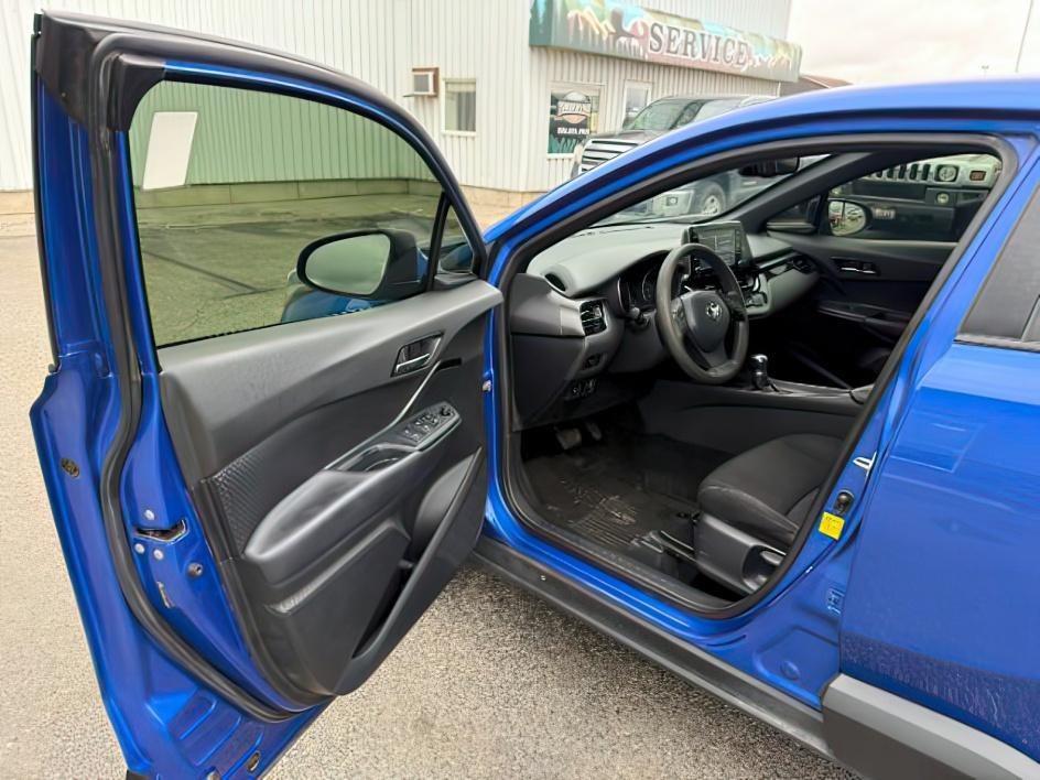 2019 BLUE /Black Toyota C-HR (JTNKHMBX4K1) with an 2L I-4 DOHC engine, Automatic transmission, located at 1175 N Woodruff Ave, Idaho Falls, ID, 83401, 43.506901, -111.999657 - This 2019 Toyota C-HR is a compact crossover built for efficient daily driving with easy maneuverability and a comfortable ride. Powered by a 2.0L 4-cylinder engine, it delivers solid fuel efficiency and dependable performance for commuting and around-town use. Its smaller footprint makes parking an- Photo#9