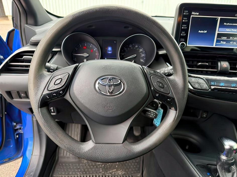 2019 BLUE /Black Toyota C-HR (JTNKHMBX4K1) with an 2L I-4 DOHC engine, Automatic transmission, located at 1175 N Woodruff Ave, Idaho Falls, ID, 83401, 43.506901, -111.999657 - This 2019 Toyota C-HR is a compact crossover built for efficient daily driving with easy maneuverability and a comfortable ride. Powered by a 2.0L 4-cylinder engine, it delivers solid fuel efficiency and dependable performance for commuting and around-town use. Its smaller footprint makes parking an- Photo#12