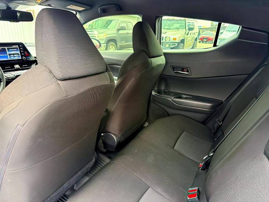 2019 BLUE /Black Toyota C-HR (JTNKHMBX4K1) with an 2L I-4 DOHC engine, Automatic transmission, located at 1175 N Woodruff Ave, Idaho Falls, ID, 83401, 43.506901, -111.999657 - This 2019 Toyota C-HR is a compact crossover built for efficient daily driving with easy maneuverability and a comfortable ride. Powered by a 2.0L 4-cylinder engine, it delivers solid fuel efficiency and dependable performance for commuting and around-town use. Its smaller footprint makes parking an- Photo#18