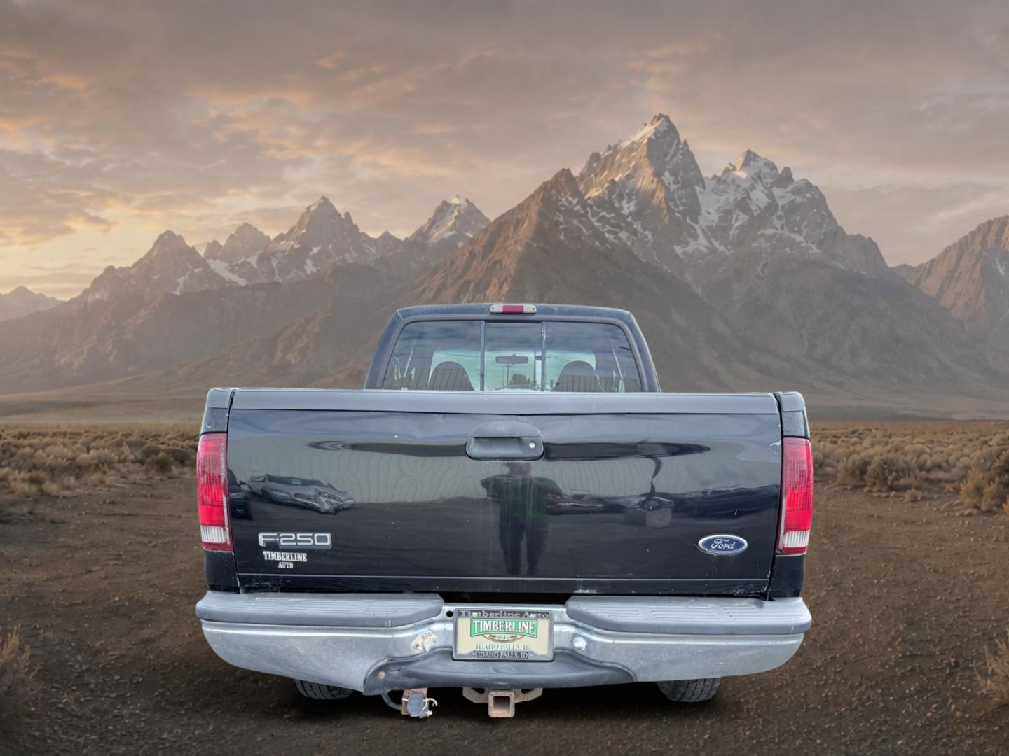 1999 Black Clearcoat /Medium Graphite Ford F-250 XLT (1FTNX21S8XE) with an V10, 6.8L (415 CID) engine, 4-speed automatic transmission, located at 1175 N Woodruff Ave, Idaho Falls, ID, 83401, 43.506901, -111.999657 - <b>Vehicle Details</b><br>Power, capability, and classic Ford toughness come together in this 1999 Ford F-250 Super Duty XLT 4WD, now available in Idaho Falls, ID. Built to handle hard work and weekend adventure alike, this heavy-duty pickup is powered by the legendary V10 6.8L (415 CID) gasoline en- Photo#3