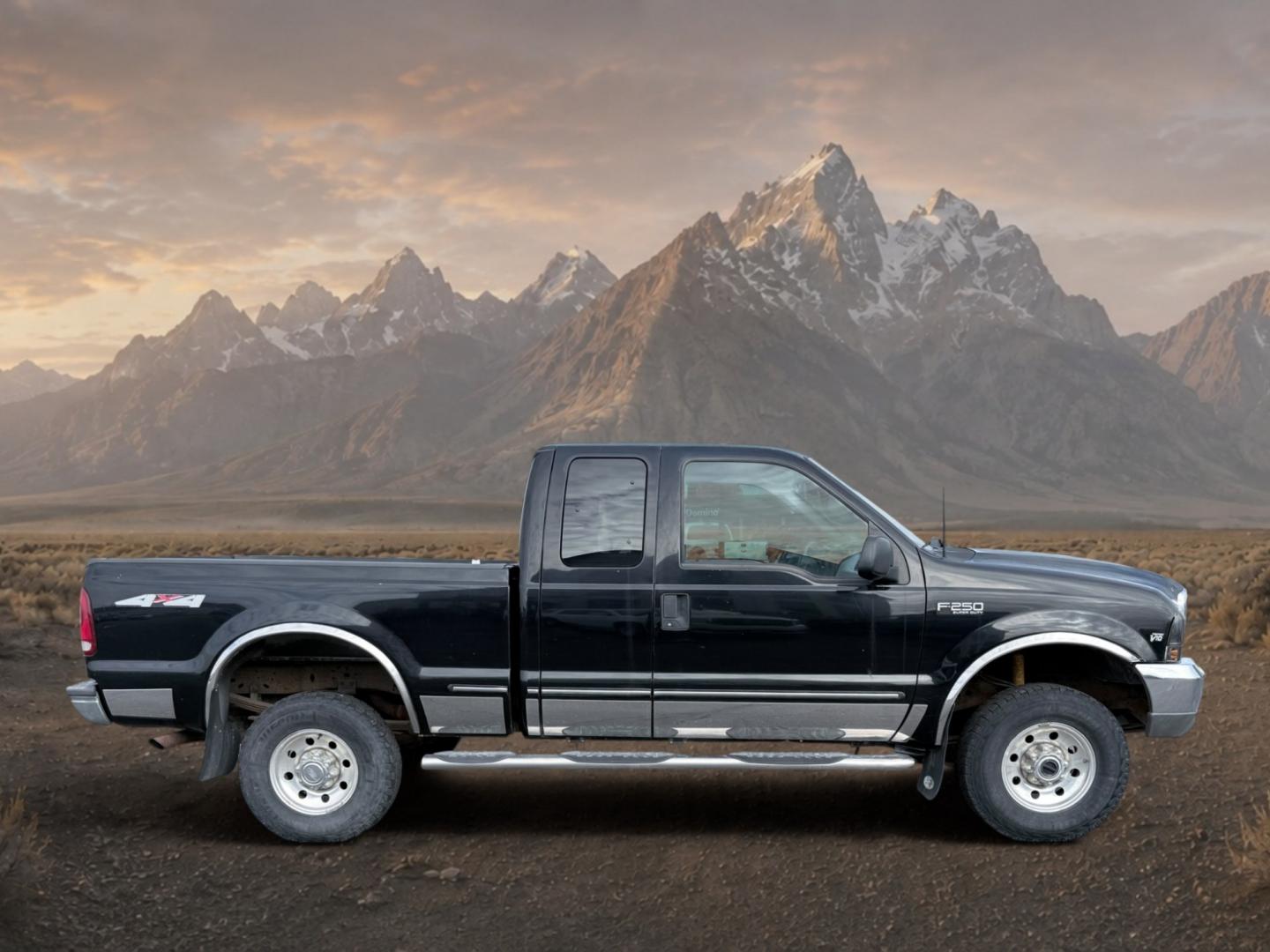 1999 Black Clearcoat /Medium Graphite Ford F-250 XLT (1FTNX21S8XE) with an V10, 6.8L (415 CID) engine, 4-speed automatic transmission, located at 1175 N Woodruff Ave, Idaho Falls, ID, 83401, 43.506901, -111.999657 - <b>Vehicle Details</b><br>Power, capability, and classic Ford toughness come together in this 1999 Ford F-250 Super Duty XLT 4WD, now available in Idaho Falls, ID. Built to handle hard work and weekend adventure alike, this heavy-duty pickup is powered by the legendary V10 6.8L (415 CID) gasoline en- Photo#5
