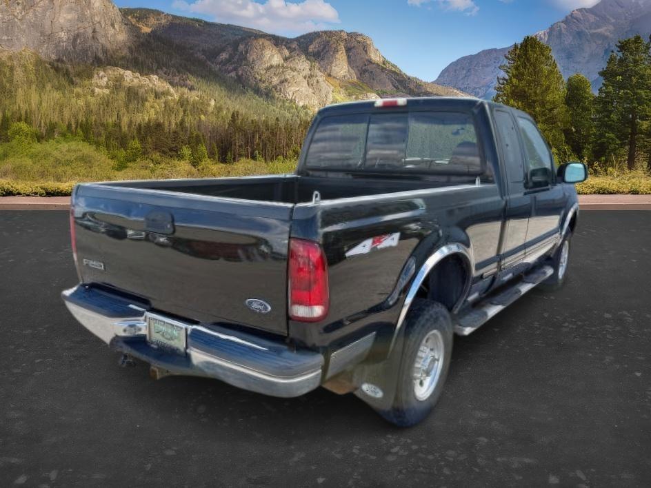 1999 Black Clearcoat /Medium Graphite Ford F-250 XLT (1FTNX21S8XE) with an V10, 6.8L (415 CID) engine, 4-speed automatic transmission, located at 1175 N Woodruff Ave, Idaho Falls, ID, 83401, 43.506901, -111.999657 - <b>Vehicle Details</b><br>Power, capability, and classic Ford toughness come together in this 1999 Ford F-250 Super Duty XLT 4WD, now available in Idaho Falls, ID. Built to handle hard work and weekend adventure alike, this heavy-duty pickup is powered by the legendary V10 6.8L (415 CID) gasoline en- Photo#25