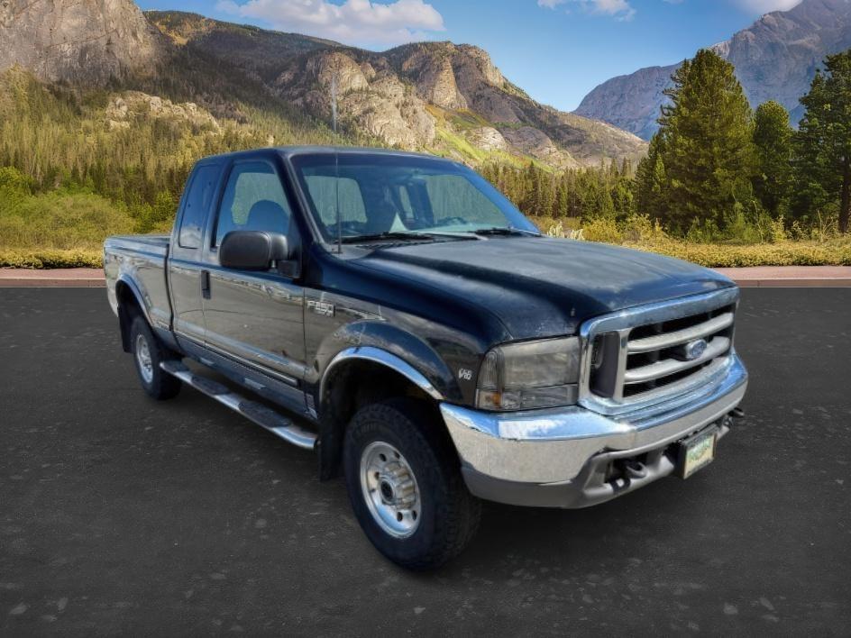 1999 Black Clearcoat /Medium Graphite Ford F-250 XLT (1FTNX21S8XE) with an V10, 6.8L (415 CID) engine, 4-speed automatic transmission, located at 1175 N Woodruff Ave, Idaho Falls, ID, 83401, 43.506901, -111.999657 - <b>Vehicle Details</b><br>Power, capability, and classic Ford toughness come together in this 1999 Ford F-250 Super Duty XLT 4WD, now available in Idaho Falls, ID. Built to handle hard work and weekend adventure alike, this heavy-duty pickup is powered by the legendary V10 6.8L (415 CID) gasoline en- Photo#27