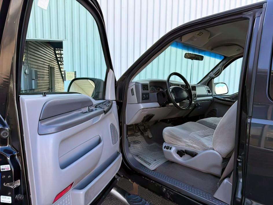 1999 Black Clearcoat /Medium Graphite Ford F-250 XLT (1FTNX21S8XE) with an V10, 6.8L (415 CID) engine, 4-speed automatic transmission, located at 1175 N Woodruff Ave, Idaho Falls, ID, 83401, 43.506901, -111.999657 - <b>Vehicle Details</b><br>Power, capability, and classic Ford toughness come together in this 1999 Ford F-250 Super Duty XLT 4WD, now available in Idaho Falls, ID. Built to handle hard work and weekend adventure alike, this heavy-duty pickup is powered by the legendary V10 6.8L (415 CID) gasoline en- Photo#31