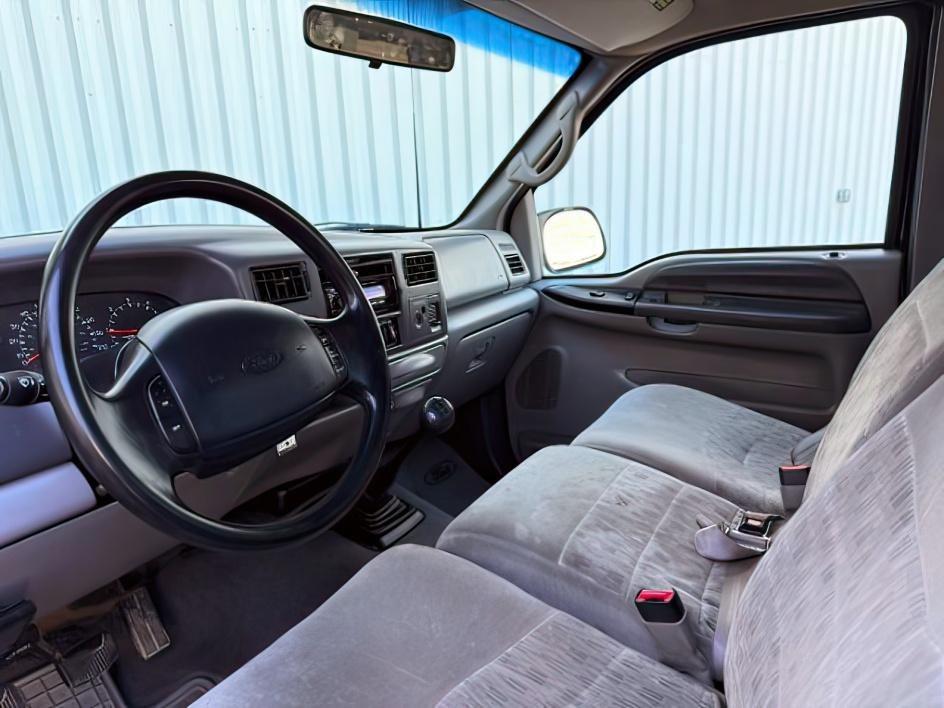 1999 Black Clearcoat /Medium Graphite Ford F-250 XLT (1FTNX21S8XE) with an V10, 6.8L (415 CID) engine, 4-speed automatic transmission, located at 1175 N Woodruff Ave, Idaho Falls, ID, 83401, 43.506901, -111.999657 - <b>Vehicle Details</b><br>Power, capability, and classic Ford toughness come together in this 1999 Ford F-250 Super Duty XLT 4WD, now available in Idaho Falls, ID. Built to handle hard work and weekend adventure alike, this heavy-duty pickup is powered by the legendary V10 6.8L (415 CID) gasoline en- Photo#33