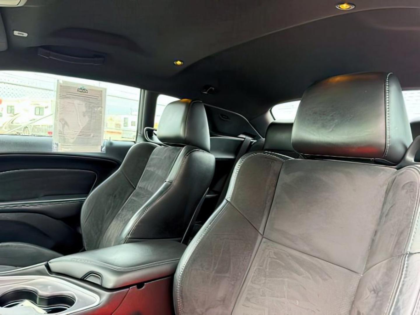 2019 RED /Black Dodge Challenger (2C3CDZKG2KH) with an Pentastar 36L V-6 DOHC engine, Automatic transmission, located at 1175 N Woodruff Ave, Idaho Falls, ID, 83401, 43.506901, -111.999657 - At Timberline Auto, finding a great deal on your next vehicle is always easy! Our experienced sales staff's goal is to help find you the right vehicle at the right price! Our knowledgeable finance department has options for almost any credit score. We offer extended service contract options to prote - Photo#16