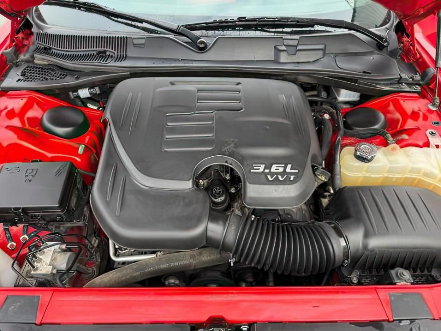 2019 RED /Black Dodge Challenger (2C3CDZKG2KH) with an Pentastar 36L V-6 DOHC engine, Automatic transmission, located at 1175 N Woodruff Ave, Idaho Falls, ID, 83401, 43.506901, -111.999657 - At Timberline Auto, finding a great deal on your next vehicle is always easy! Our experienced sales staff's goal is to help find you the right vehicle at the right price! Our knowledgeable finance department has options for almost any credit score. We offer extended service contract options to prote - Photo#19