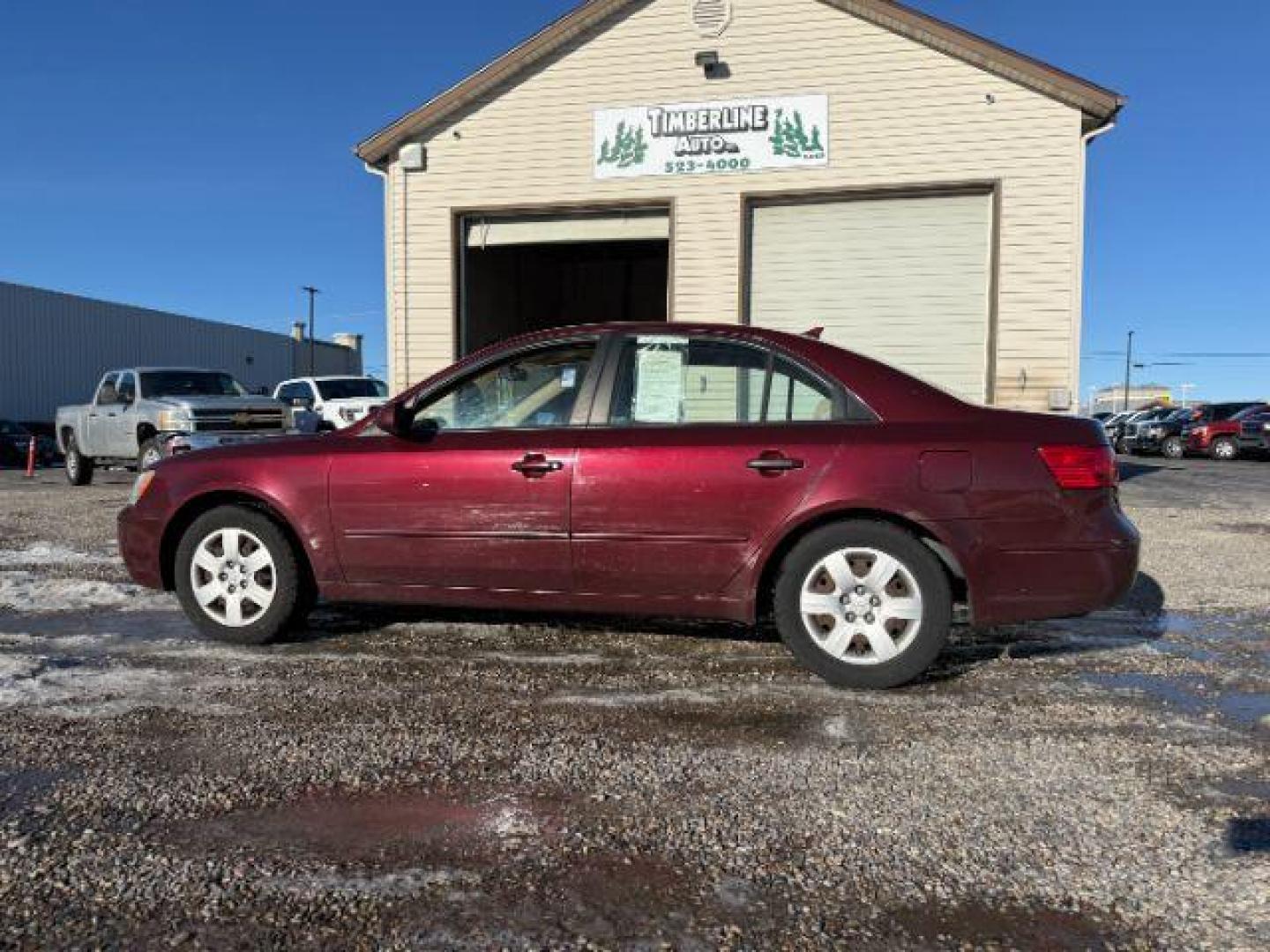 2009 MAROON /Gray Hyundai Sonata (5NPET46C99H) with an 24L I-4 DOHC engine, Automatic transmission, located at 1175 N Woodruff Ave, Idaho Falls, ID, 83401, 43.506901, -111.999657 - At Timberline Auto, finding a great deal on your next vehicle is always easy! Our experienced sales staff's goal is to help find you the right vehicle at the right price! Our knowledgeable finance department has options for almost any credit score. We offer extended service contract options to prote - Photo#1
