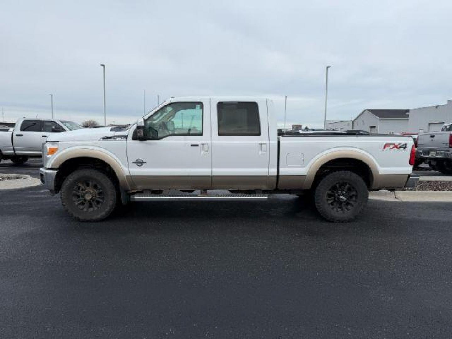 2012 Oxford White /Adobe Ford F-250 (1FT7W2BT5CE) with an Powerstroke 67L V-8 diesel direct injection engine, Automatic transmission, located at 1175 N Woodruff Ave, Idaho Falls, ID, 83401, 43.506901, -111.999657 - At Timberline Auto, finding a great deal on your next vehicle is always easy! Our experienced sales staff's goal is to help find you the right vehicle at the right price! Our knowledgeable finance department has options for almost any credit score. We offer extended service contract options to prote - Photo#1