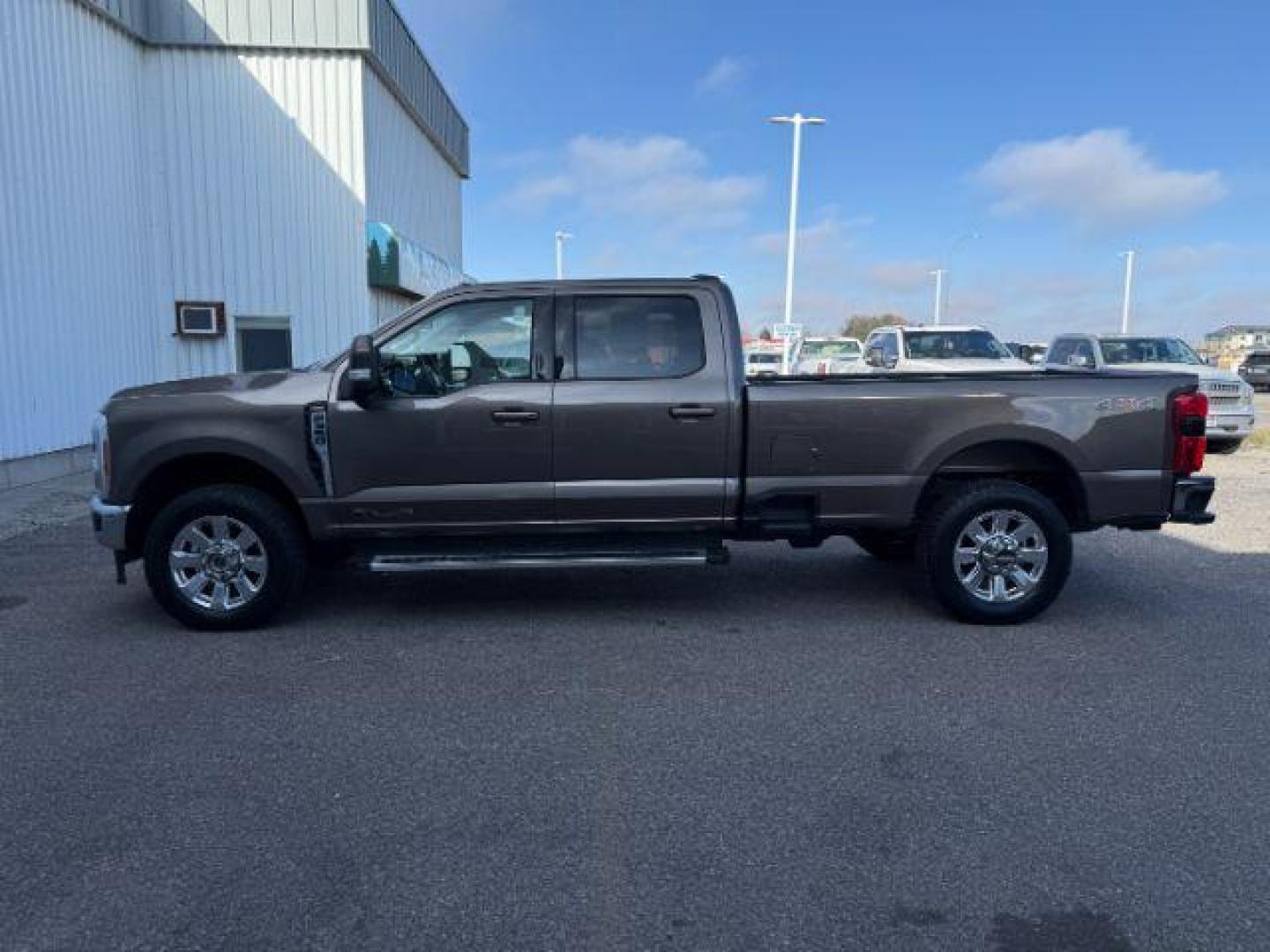 2023 GOLD /LEATHER Ford Super Duty F-350 SRW (1FT8W3BT5PE) with an 67L engine, Automatic transmission, located at 1175 N Woodruff Ave, Idaho Falls, ID, 83401, 43.506901, -111.999657 - At Timberline Auto, finding a great deal on your next vehicle is always easy! Our experienced sales staff's goal is to help find you the right vehicle at the right price! Our knowledgeable finance department has options for almost any credit score. We offer extended service contract options to prote - Photo#27