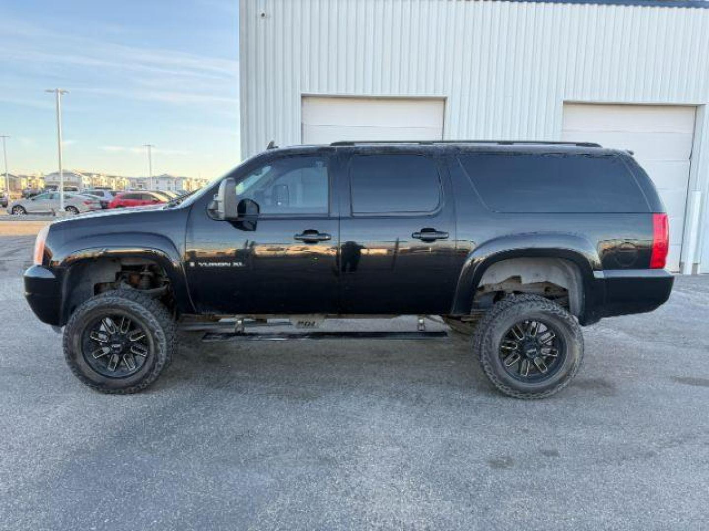 2008 Onyx Black /Ebony GMC Yukon XL 2500 (1GKGK26KX8R) with an Vortec 6L V-8 variable valve control engine, Automatic transmission, located at 1175 N Woodruff Ave, Idaho Falls, ID, 83401, 43.506901, -111.999657 - At Timberline Auto, finding a great deal on your next vehicle is always easy! Our experienced sales staff's goal is to help find you the right vehicle at the right price! Our knowledgeable finance department has options for almost any credit score. We offer extended service contract options to prote - Photo#25