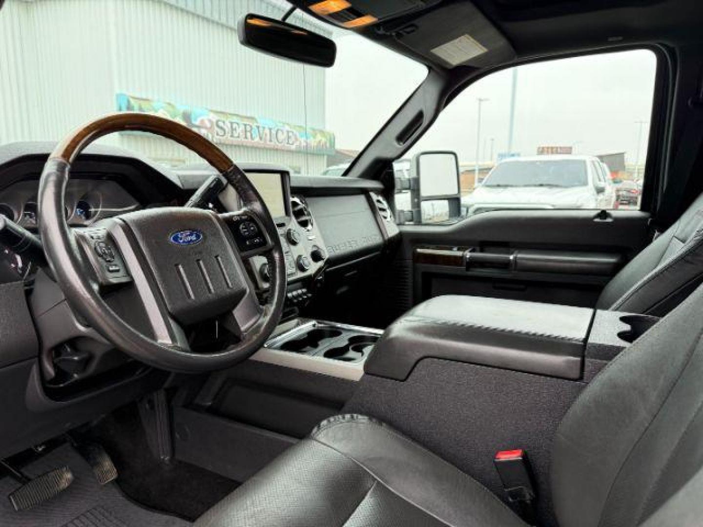 2015 Tuxedo Black Metallic /Black Ford F-350 PLATINUM (1FT8W3BT1FE) with an Powerstroke 6.7L V-8 diesel direct injection engine, AUTOMATIC transmission, located at 1235 N Woodruff Ave., Idaho Falls, 83401, (208) 523-1053, 43.507172, -112.000488 - Photo#37