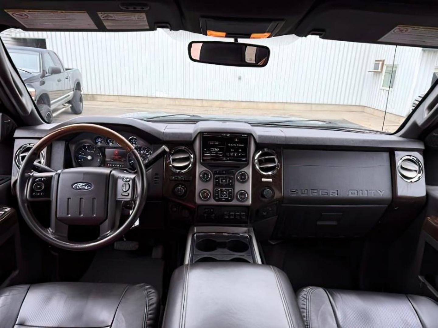 2015 Tuxedo Black Metallic /Black Ford F-350 PLATINUM (1FT8W3BT1FE) with an Powerstroke 6.7L V-8 diesel direct injection engine, AUTOMATIC transmission, located at 1235 N Woodruff Ave., Idaho Falls, 83401, (208) 523-1053, 43.507172, -112.000488 - Photo#21