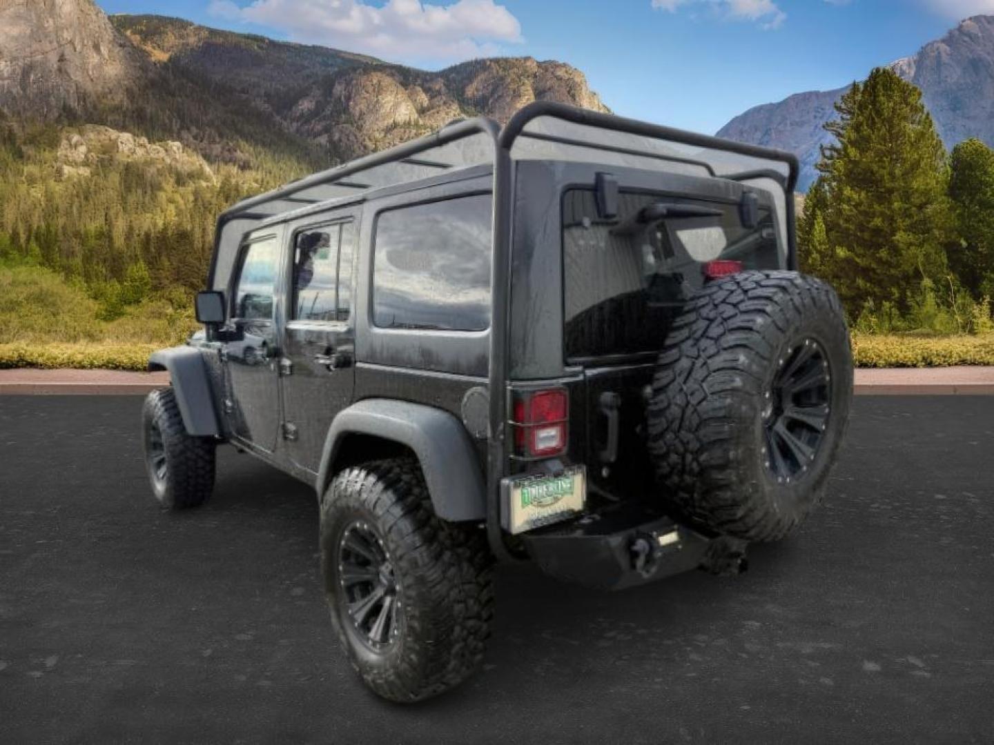 2011 Black Clearcoat /Black Jeep Wrangler Unlimited (1J4HA6H19BL) with an 38L V-6 regular unleaded engine, Automatic transmission, located at 1175 N Woodruff Ave, Idaho Falls, ID, 83401, 43.506901, -111.999657 - At Timberline Auto, finding a great deal on your next vehicle is always easy! Our experienced sales staff's goal is to help find you the right vehicle at the right price! Our knowledgeable finance department has options for almost any credit score. We offer extended service contract options to prote - Photo#2
