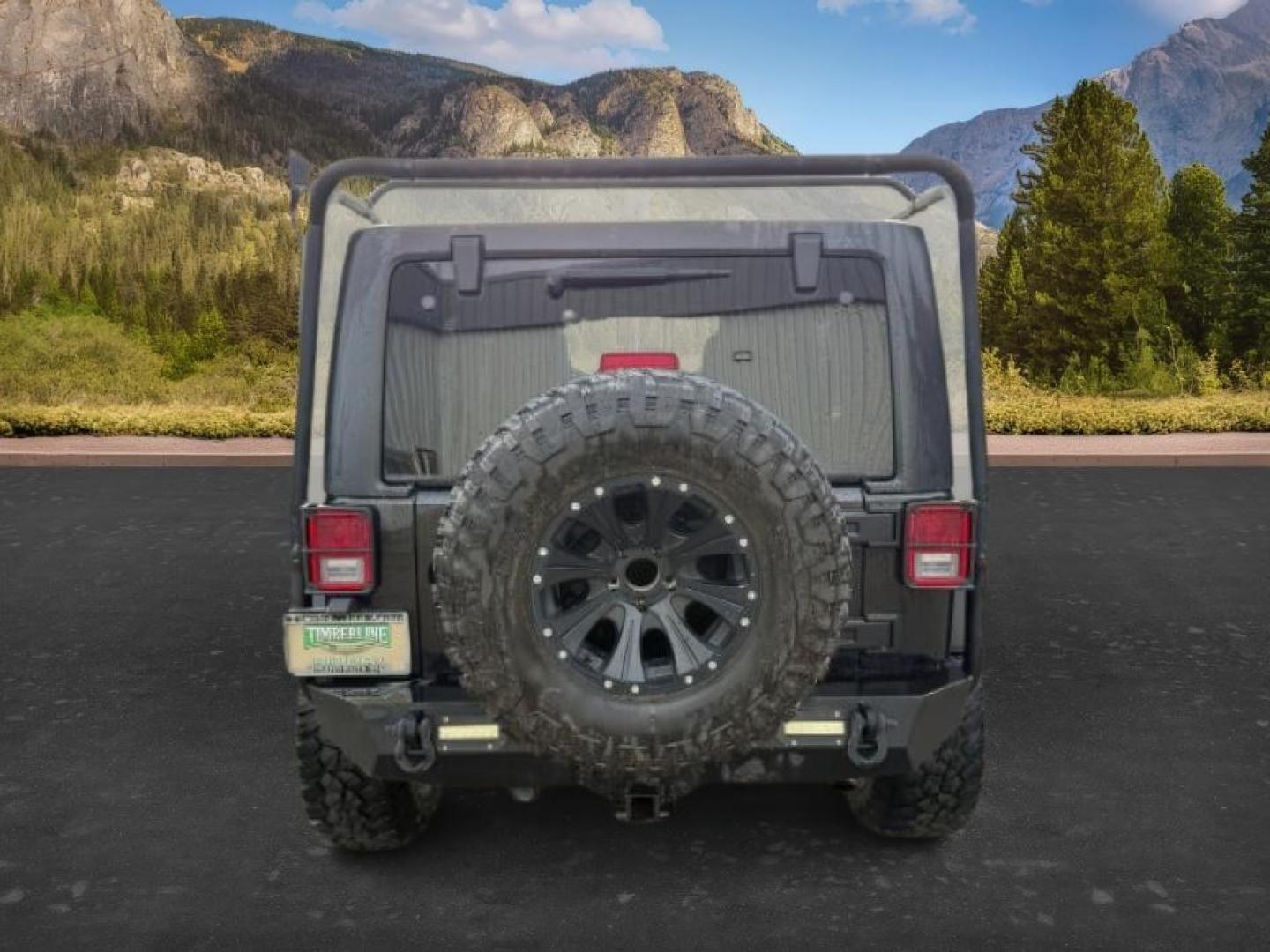 2011 Black Clearcoat /Black Jeep Wrangler Unlimited (1J4HA6H19BL) with an 38L V-6 regular unleaded engine, Automatic transmission, located at 1175 N Woodruff Ave, Idaho Falls, ID, 83401, 43.506901, -111.999657 - At Timberline Auto, finding a great deal on your next vehicle is always easy! Our experienced sales staff's goal is to help find you the right vehicle at the right price! Our knowledgeable finance department has options for almost any credit score. We offer extended service contract options to prote - Photo#3