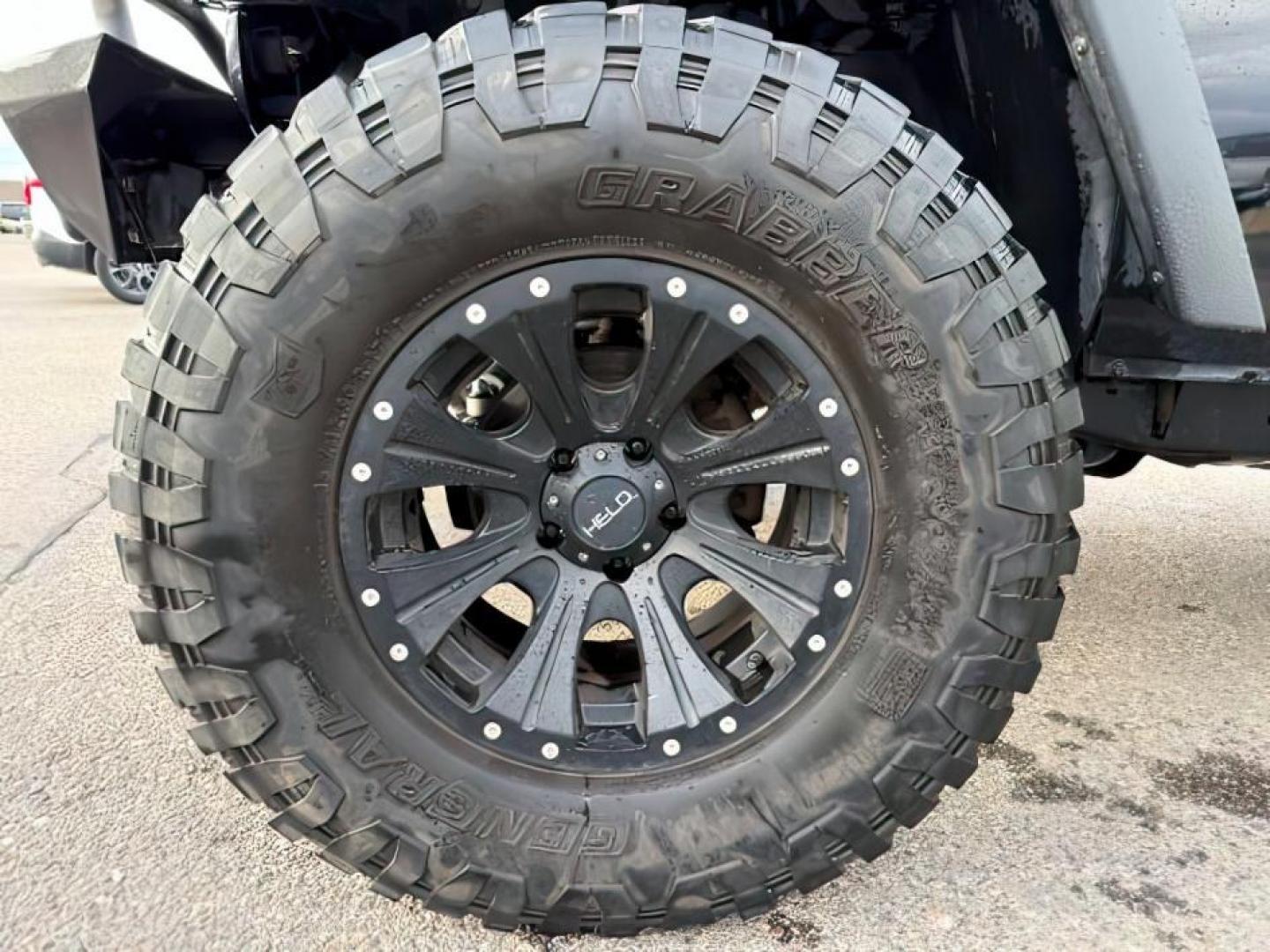 2011 Black Clearcoat /Black Jeep Wrangler Unlimited (1J4HA6H19BL) with an 38L V-6 regular unleaded engine, Automatic transmission, located at 1175 N Woodruff Ave, Idaho Falls, ID, 83401, 43.506901, -111.999657 - At Timberline Auto, finding a great deal on your next vehicle is always easy! Our experienced sales staff's goal is to help find you the right vehicle at the right price! Our knowledgeable finance department has options for almost any credit score. We offer extended service contract options to prote - Photo#11
