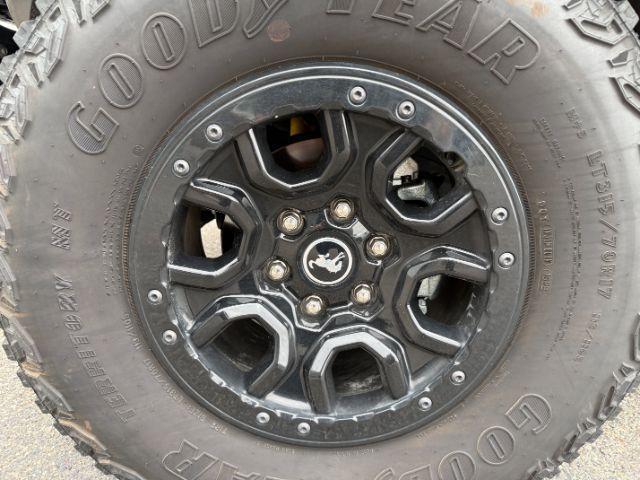 2022 SILVER /Medium Sandstone w/Black Onyx Ford Bronco (1FMEE5DP3NL) with an EcoBoost 27L V-6 portdirect injection engine, Automatic transmission, located at 1175 N Woodruff Ave, Idaho Falls, ID, 83401, 43.506901, -111.999657 - This 2022 Ford Bronco is a modern off-road SUV built to balance everyday driving comfort with serious adventure capability. Powered by a 2.7L EcoBoost V6, it delivers strong, responsive performance whether on the highway or exploring rougher terrain. The interior features leather seating with heated- Photo#37