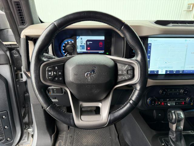 2022 SILVER /Medium Sandstone w/Black Onyx Ford Bronco (1FMEE5DP3NL) with an EcoBoost 27L V-6 portdirect injection engine, Automatic transmission, located at 1175 N Woodruff Ave, Idaho Falls, ID, 83401, 43.506901, -111.999657 - This 2022 Ford Bronco is a modern off-road SUV built to balance everyday driving comfort with serious adventure capability. Powered by a 2.7L EcoBoost V6, it delivers strong, responsive performance whether on the highway or exploring rougher terrain. The interior features leather seating with heated- Photo#41