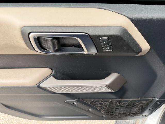 2022 SILVER /Medium Sandstone w/Black Onyx Ford Bronco (1FMEE5DP3NL) with an EcoBoost 27L V-6 portdirect injection engine, Automatic transmission, located at 1175 N Woodruff Ave, Idaho Falls, ID, 83401, 43.506901, -111.999657 - This 2022 Ford Bronco is a modern off-road SUV built to balance everyday driving comfort with serious adventure capability. Powered by a 2.7L EcoBoost V6, it delivers strong, responsive performance whether on the highway or exploring rougher terrain. The interior features leather seating with heated- Photo#48