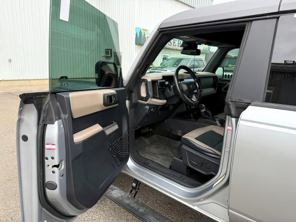2022 SILVER /Medium Sandstone w/Black Onyx Ford Bronco (1FMEE5DP3NL) with an EcoBoost 27L V-6 portdirect injection engine, Automatic transmission, located at 1175 N Woodruff Ave, Idaho Falls, ID, 83401, 43.506901, -111.999657 - This 2022 Ford Bronco is a modern off-road SUV built to balance everyday driving comfort with serious adventure capability. Powered by a 2.7L EcoBoost V6, it delivers strong, responsive performance whether on the highway or exploring rougher terrain. The interior features leather seating with heated- Photo#12