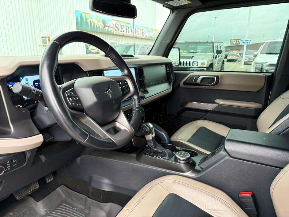 2022 SILVER /Medium Sandstone w/Black Onyx Ford Bronco (1FMEE5DP3NL) with an EcoBoost 27L V-6 portdirect injection engine, Automatic transmission, located at 1175 N Woodruff Ave, Idaho Falls, ID, 83401, 43.506901, -111.999657 - This 2022 Ford Bronco is a modern off-road SUV built to balance everyday driving comfort with serious adventure capability. Powered by a 2.7L EcoBoost V6, it delivers strong, responsive performance whether on the highway or exploring rougher terrain. The interior features leather seating with heated- Photo#14