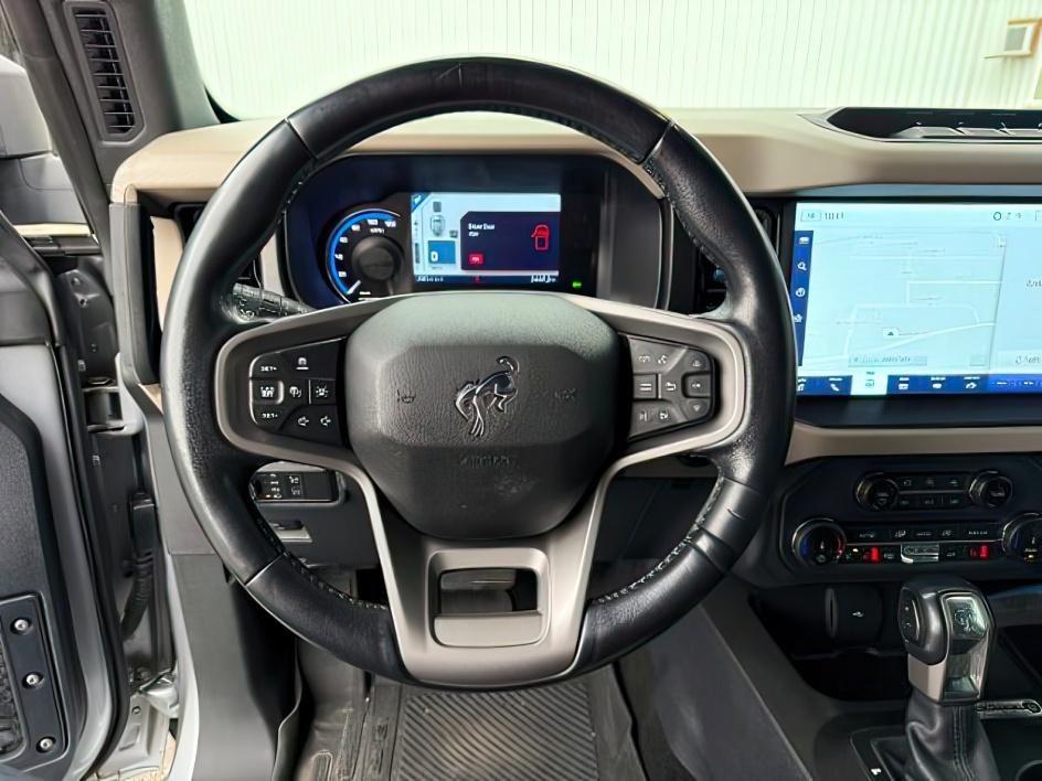 2022 SILVER /Medium Sandstone w/Black Onyx Ford Bronco (1FMEE5DP3NL) with an EcoBoost 27L V-6 portdirect injection engine, Automatic transmission, located at 1175 N Woodruff Ave, Idaho Falls, ID, 83401, 43.506901, -111.999657 - This 2022 Ford Bronco is a modern off-road SUV built to balance everyday driving comfort with serious adventure capability. Powered by a 2.7L EcoBoost V6, it delivers strong, responsive performance whether on the highway or exploring rougher terrain. The interior features leather seating with heated- Photo#15