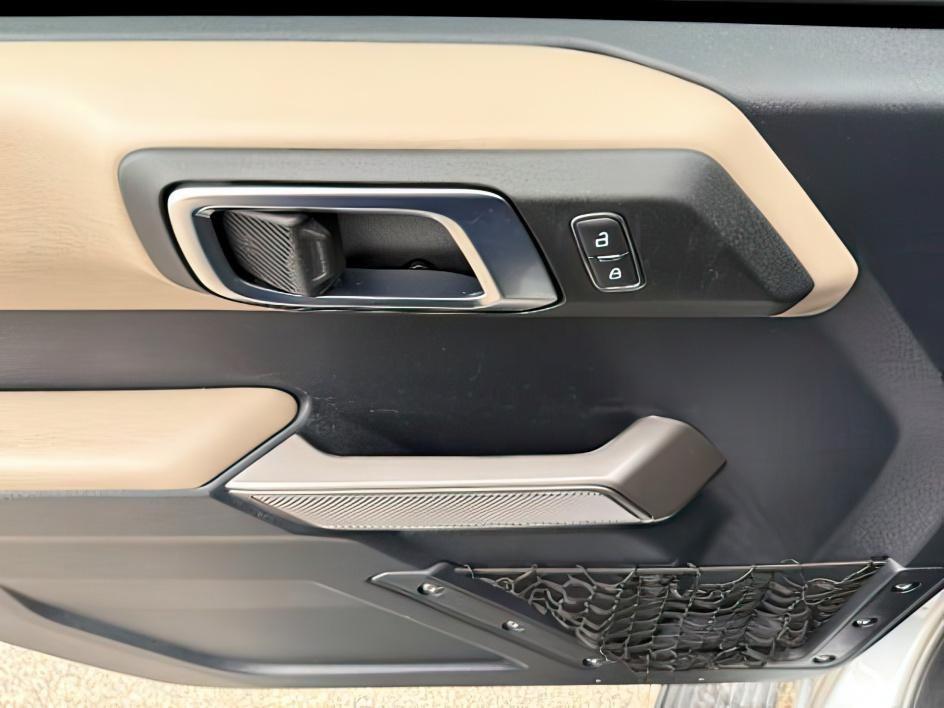2022 SILVER /Medium Sandstone w/Black Onyx Ford Bronco (1FMEE5DP3NL) with an EcoBoost 27L V-6 portdirect injection engine, Automatic transmission, located at 1175 N Woodruff Ave, Idaho Falls, ID, 83401, 43.506901, -111.999657 - This 2022 Ford Bronco is a modern off-road SUV built to balance everyday driving comfort with serious adventure capability. Powered by a 2.7L EcoBoost V6, it delivers strong, responsive performance whether on the highway or exploring rougher terrain. The interior features leather seating with heated- Photo#22
