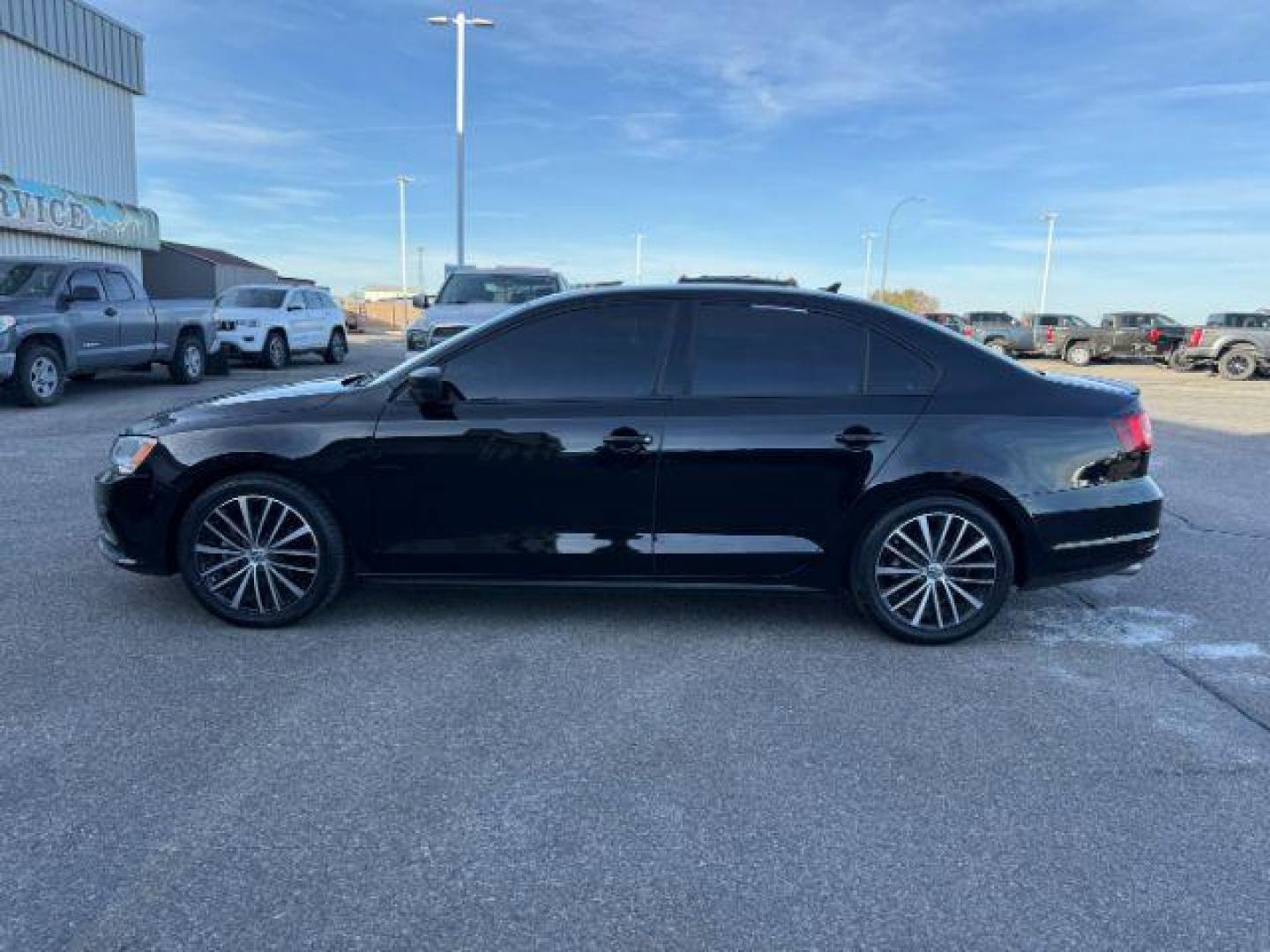 2015 Black Uni /Black Ceramique Volkswagen Jetta Sedan (3VWD17AJ3FM) with an 18L I-4 gasoline direct injection engine, Automatic transmission, located at 1175 N Woodruff Ave, Idaho Falls, ID, 83401, 43.506901, -111.999657 - At Timberline Auto, finding a great deal on your next vehicle is always easy! Our experienced sales staff's goal is to help find you the right vehicle at the right price! Our knowledgeable finance department has options for almost any credit score. We offer extended service contract options to prote - Photo#21