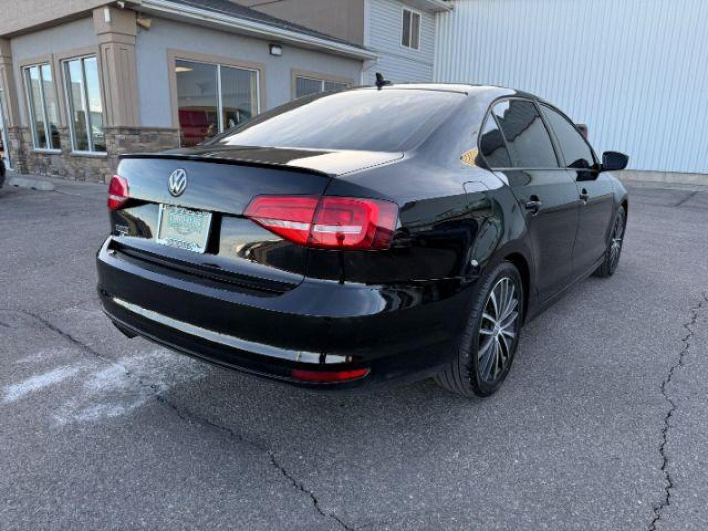 2015 Black Uni /Black Ceramique Volkswagen Jetta Sedan (3VWD17AJ3FM) with an 18L I-4 gasoline direct injection engine, Automatic transmission, located at 1175 N Woodruff Ave, Idaho Falls, ID, 83401, 43.506901, -111.999657 - At Timberline Auto, finding a great deal on your next vehicle is always easy! Our experienced sales staff's goal is to help find you the right vehicle at the right price! Our knowledgeable finance department has options for almost any credit score. We offer extended service contract options to prote - Photo#24