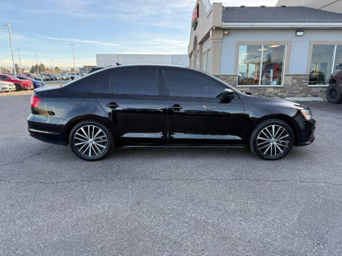 2015 Black Uni /Black Ceramique Volkswagen Jetta Sedan (3VWD17AJ3FM) with an 18L I-4 gasoline direct injection engine, Automatic transmission, located at 1175 N Woodruff Ave, Idaho Falls, ID, 83401, 43.506901, -111.999657 - At Timberline Auto, finding a great deal on your next vehicle is always easy! Our experienced sales staff's goal is to help find you the right vehicle at the right price! Our knowledgeable finance department has options for almost any credit score. We offer extended service contract options to prote - Photo#25