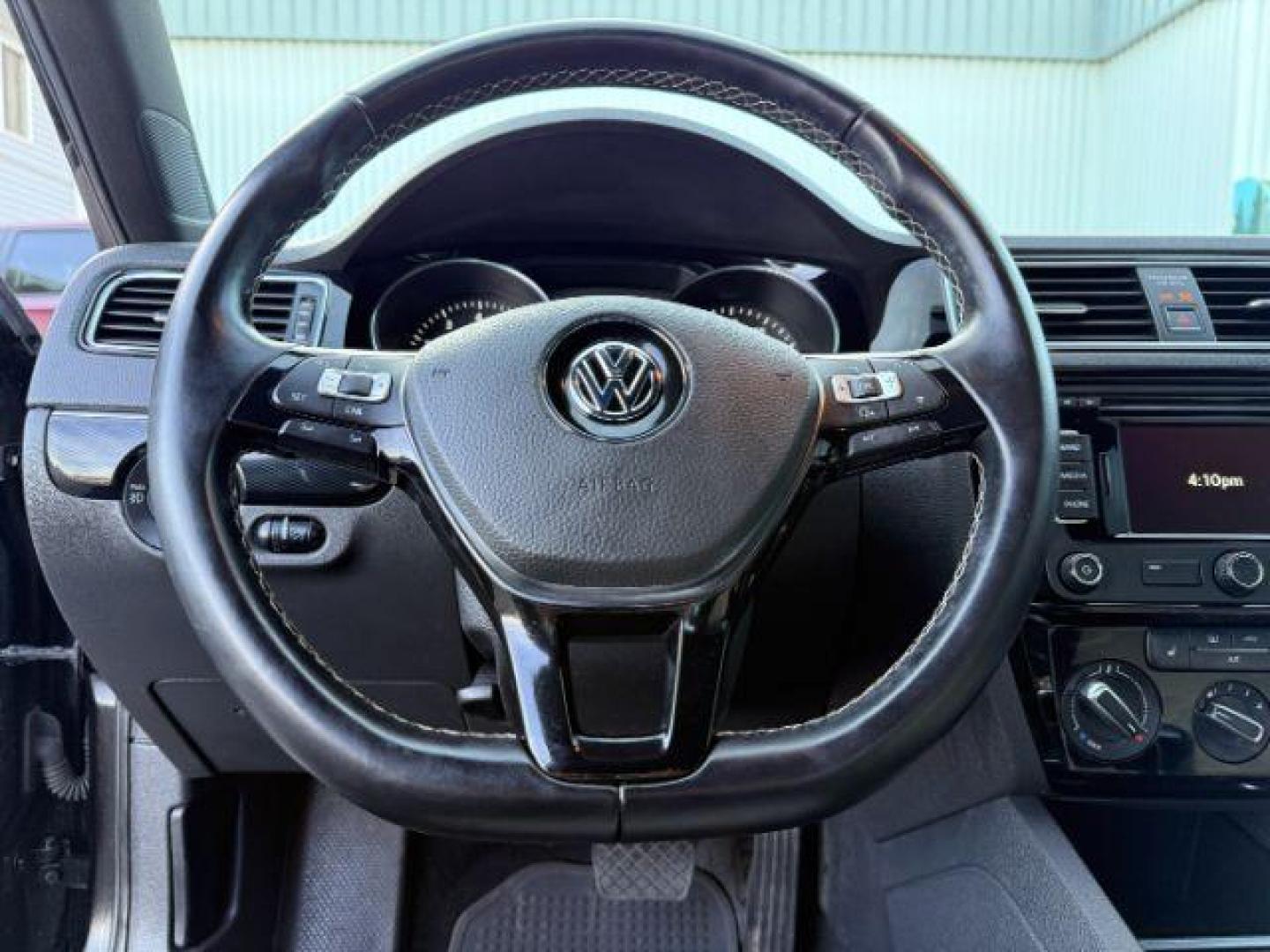 2015 Black Uni /Black Ceramique Volkswagen Jetta Sedan (3VWD17AJ3FM) with an 18L I-4 gasoline direct injection engine, Automatic transmission, located at 1175 N Woodruff Ave, Idaho Falls, ID, 83401, 43.506901, -111.999657 - At Timberline Auto, finding a great deal on your next vehicle is always easy! Our experienced sales staff's goal is to help find you the right vehicle at the right price! Our knowledgeable finance department has options for almost any credit score. We offer extended service contract options to prote - Photo#32