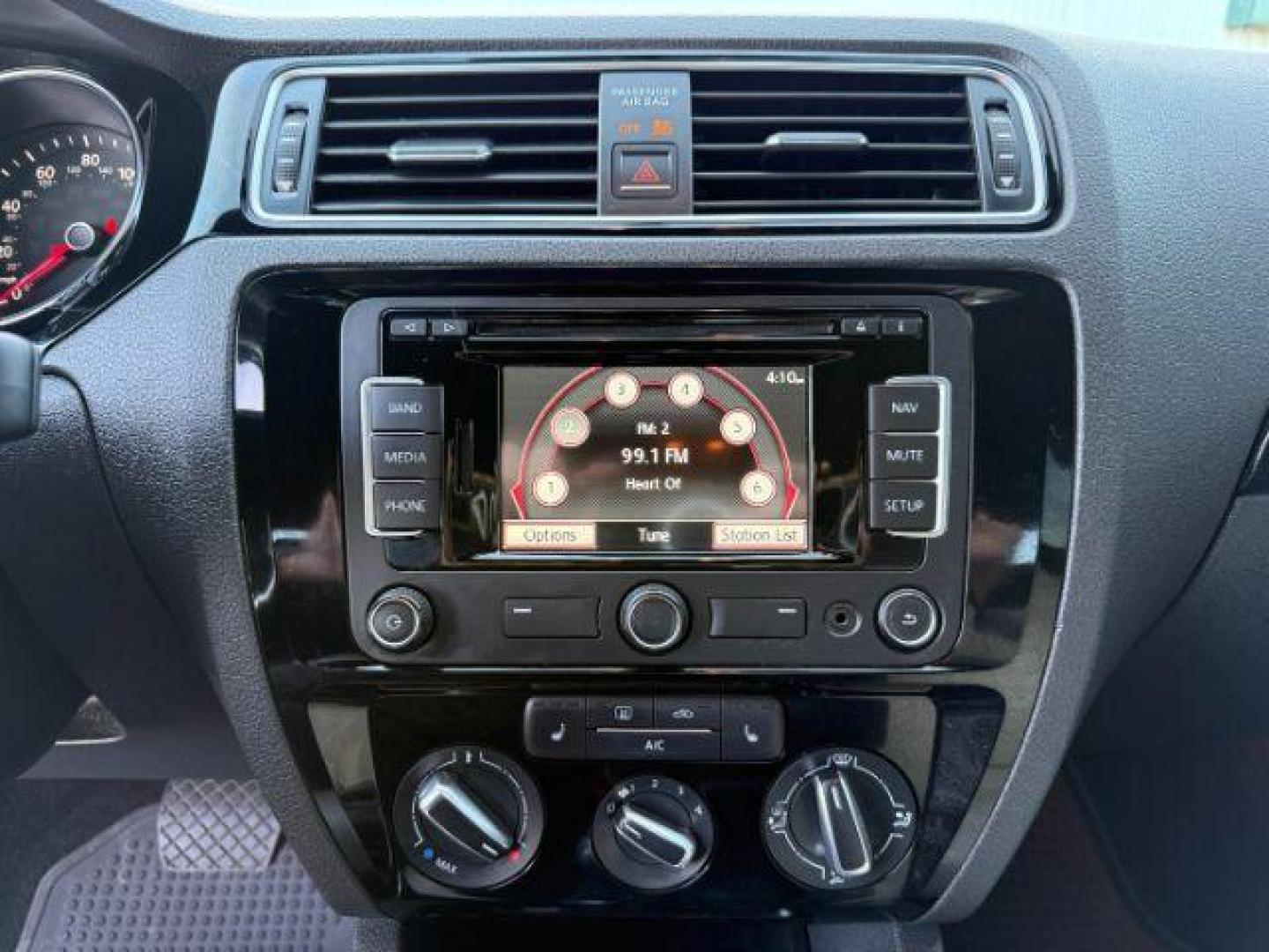 2015 Black Uni /Black Ceramique Volkswagen Jetta Sedan (3VWD17AJ3FM) with an 18L I-4 gasoline direct injection engine, Automatic transmission, located at 1175 N Woodruff Ave, Idaho Falls, ID, 83401, 43.506901, -111.999657 - At Timberline Auto, finding a great deal on your next vehicle is always easy! Our experienced sales staff's goal is to help find you the right vehicle at the right price! Our knowledgeable finance department has options for almost any credit score. We offer extended service contract options to prote - Photo#33