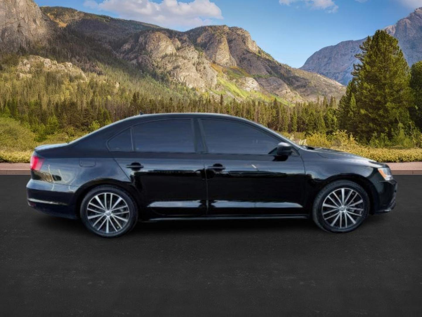 2015 Black Uni /Black Ceramique Volkswagen Jetta Sedan (3VWD17AJ3FM) with an 18L I-4 gasoline direct injection engine, Automatic transmission, located at 1175 N Woodruff Ave, Idaho Falls, ID, 83401, 43.506901, -111.999657 - At Timberline Auto, finding a great deal on your next vehicle is always easy! Our experienced sales staff's goal is to help find you the right vehicle at the right price! Our knowledgeable finance department has options for almost any credit score. We offer extended service contract options to prote - Photo#5