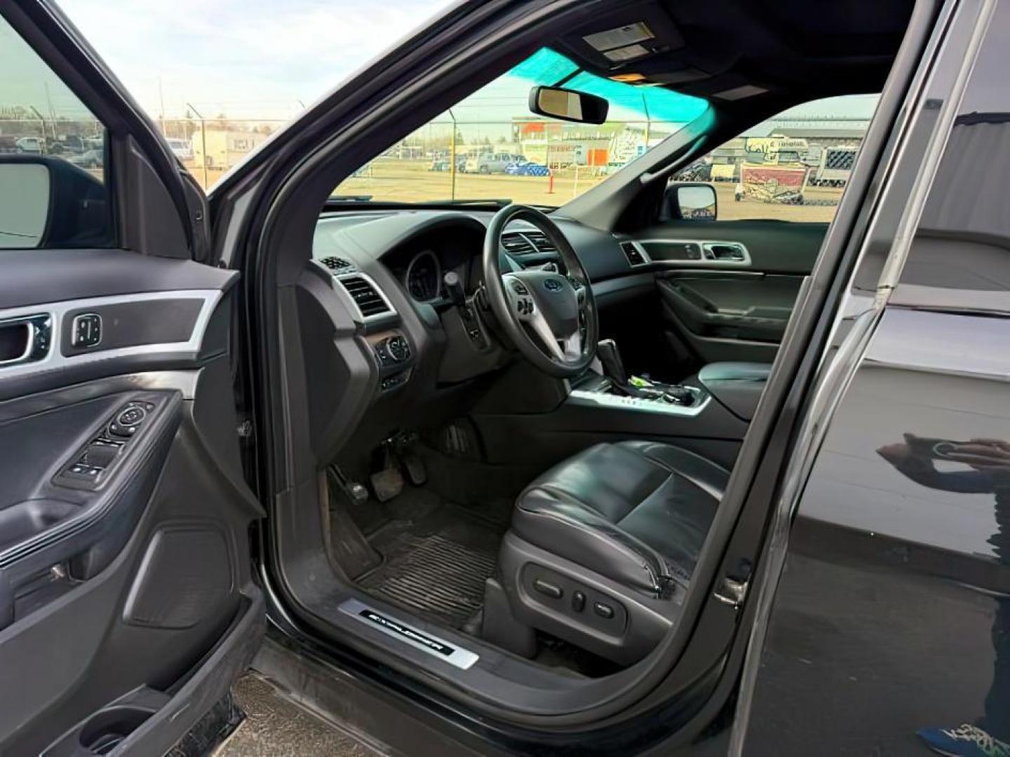 2014 Tuxedo Black Metallic /Charcoal Black Ford Explorer (1FM5K8GT9EG) with an EcoBoost 35L V-6 gasoline direct injection engine, Automatic transmission, located at 1175 N Woodruff Ave, Idaho Falls, ID, 83401, 43.506901, -111.999657 - Photo#13