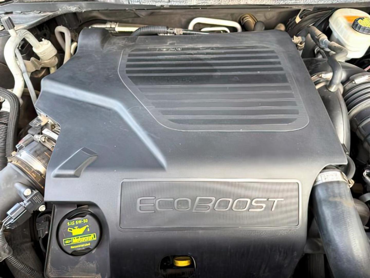 2014 Tuxedo Black Metallic /Charcoal Black Ford Explorer (1FM5K8GT9EG) with an EcoBoost 35L V-6 gasoline direct injection engine, Automatic transmission, located at 1175 N Woodruff Ave, Idaho Falls, ID, 83401, 43.506901, -111.999657 - Photo#25