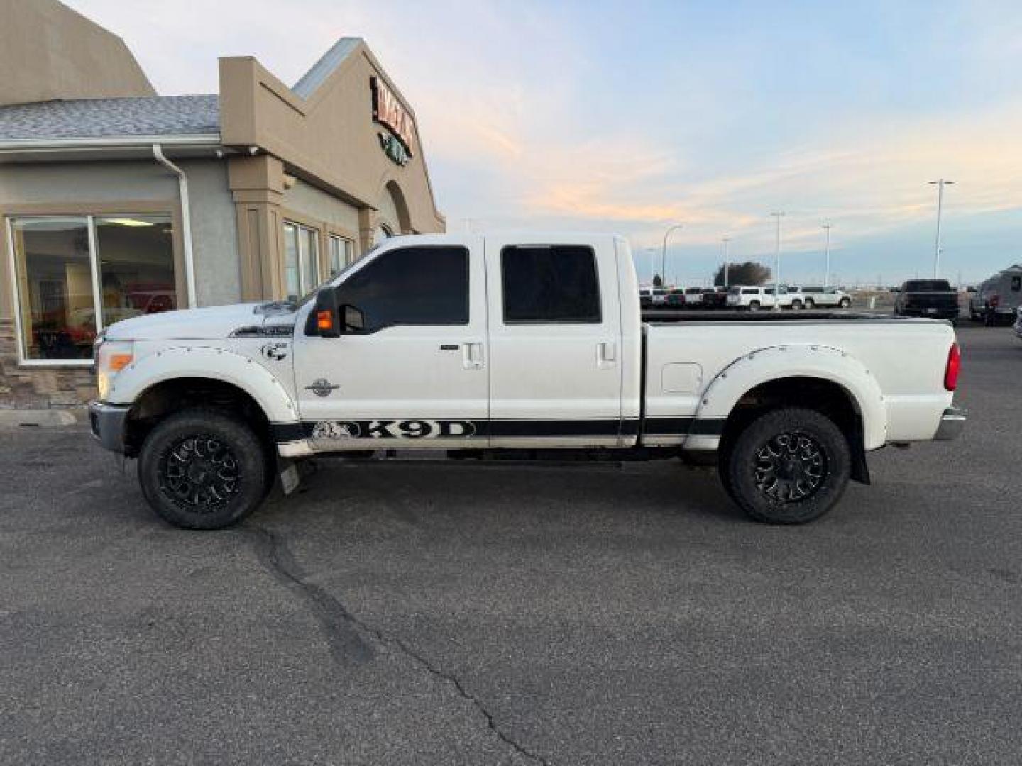 2011 White Platinum Metallic Tri-Coat /Adobe Ford F-350 LARIAT (1FT8W3BT6BE) with an Powerstroke 6.7L V-8 diesel direct injection engine, AUTOMATIC transmission, located at 1235 N Woodruff Ave., Idaho Falls, 83401, (208) 523-1053, 43.507172, -112.000488 - At Timberline Auto, finding a great deal on your next vehicle is always easy! Our experienced sales staff's goal is to help find you the right vehicle at the right price! Our knowledgeable finance department has options for almost any credit score. We offer extended service contract options to prote - Photo#0
