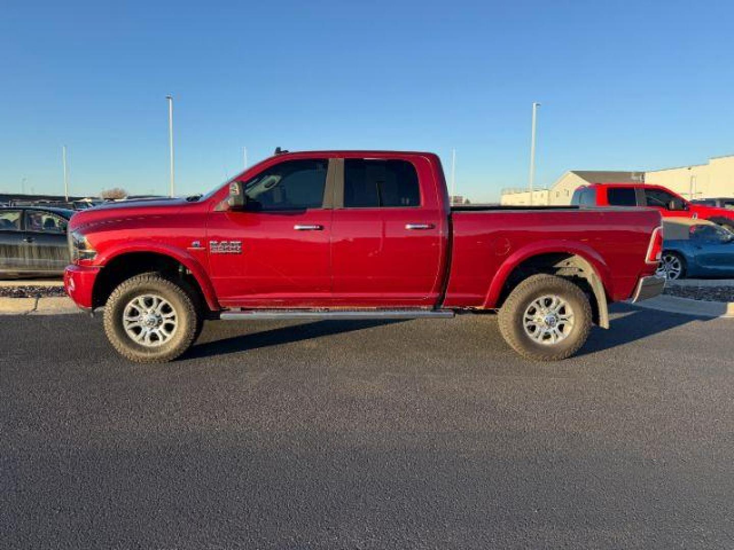 2014 RED /LEATHER Ram 2500 LARAMIE (3C6UR5FL4EG) with an 6.7L engine, AUTOMATIC transmission, located at 1235 N Woodruff Ave., Idaho Falls, 83401, (208) 523-1053, 43.507172, -112.000488 - At Timberline Auto, finding a great deal on your next vehicle is always easy! Our experienced sales staff's goal is to help find you the right vehicle at the right price! Our knowledgeable finance department has options for almost any credit score. We offer extended service contract options to prote - Photo#0