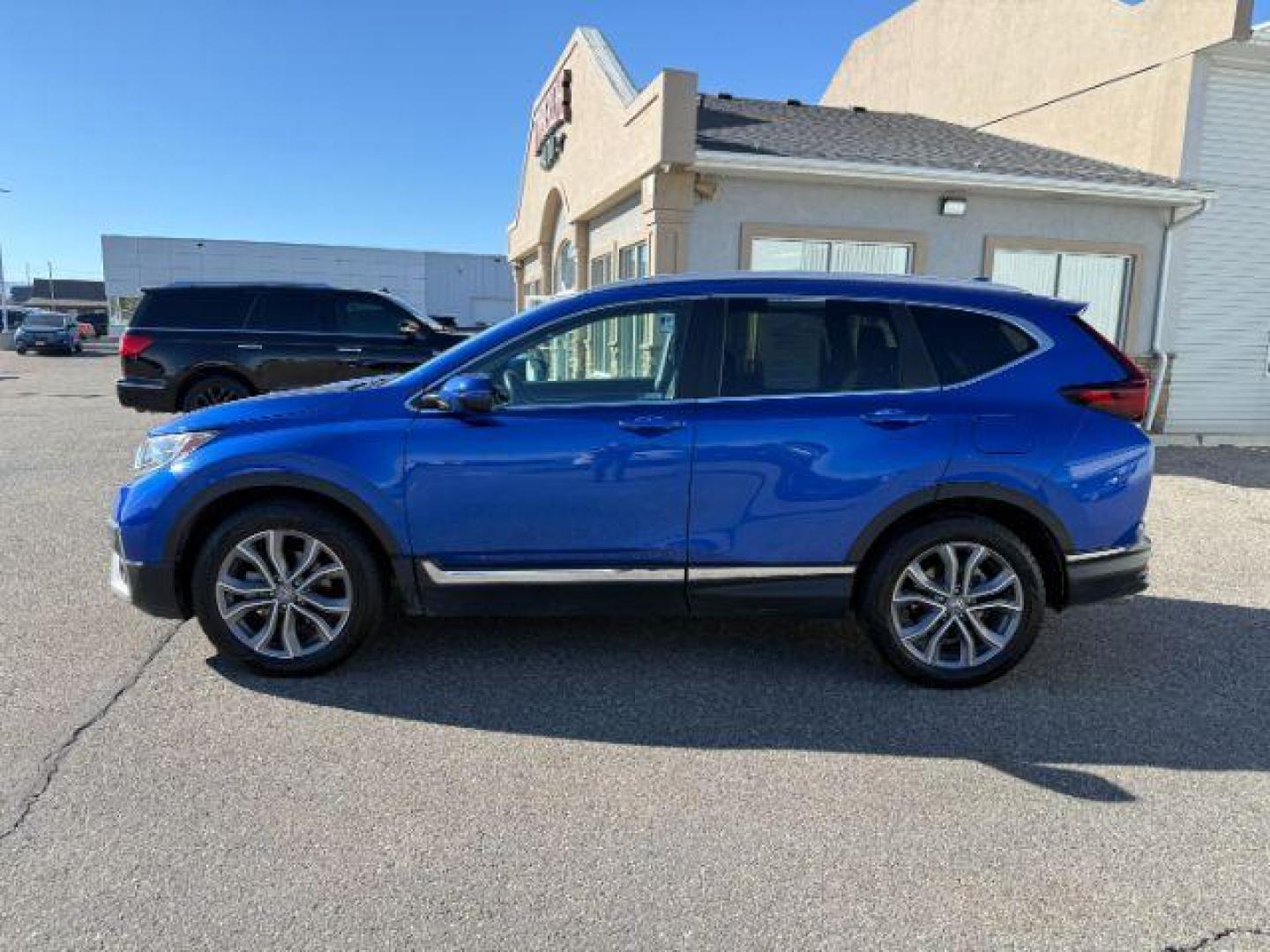 2020 BLUE /Black Honda CR-V AWD Touring (7FARW2H91LE) with an 1.5L I-4 gasoline direct injection engine, AUTOMATIC transmission, located at 1235 N Woodruff Ave., Idaho Falls, 83401, (208) 523-1053, 43.507172, -112.000488 - At Timberline Auto, finding a great deal on your next vehicle is always easy! Our experienced sales staff's goal is to help find you the right vehicle at the right price! Our knowledgeable finance department has options for almost any credit score. We offer extended service contract options to prote - Photo#32