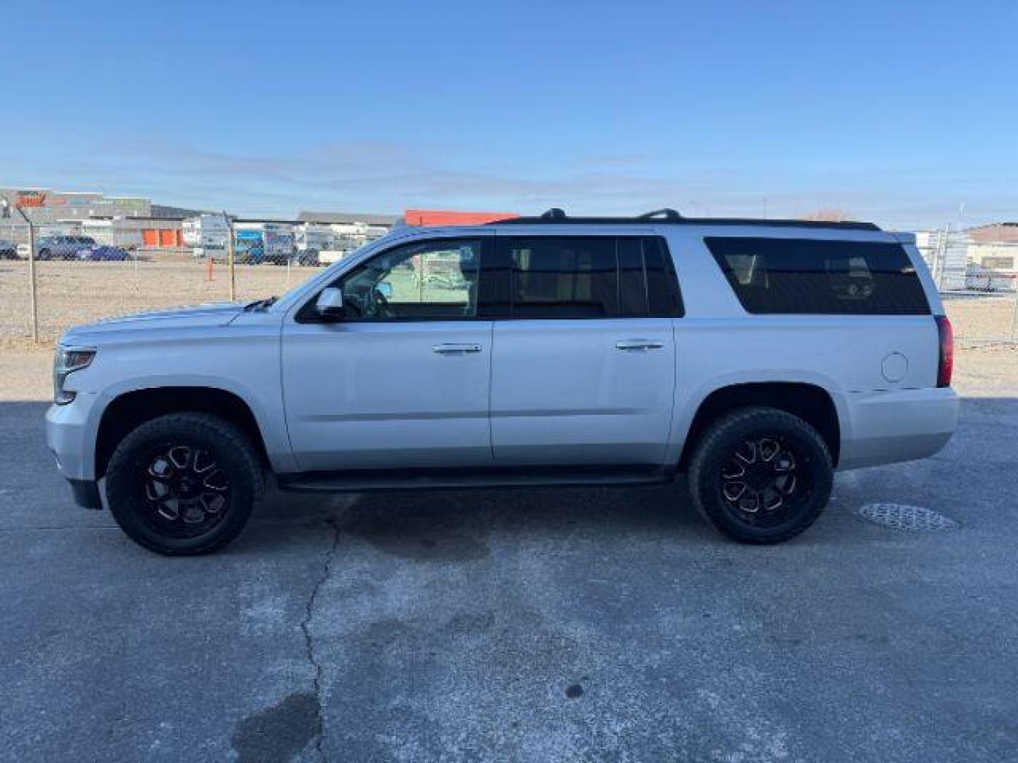 2015 SILVER /Jet Black Chevrolet Suburban 1500 (1GNSKJKC4FR) with an EcoTec3 53L V-8 gasoline direct injection engine, Automatic transmission, located at 1175 N Woodruff Ave, Idaho Falls, ID, 83401, 43.506901, -111.999657 - At Timberline Auto, finding a great deal on your next vehicle is always easy! Our experienced sales staff's goal is to help find you the right vehicle at the right price! Our knowledgeable finance department has options for almost any credit score. We offer extended service contract options to prote - Photo#1