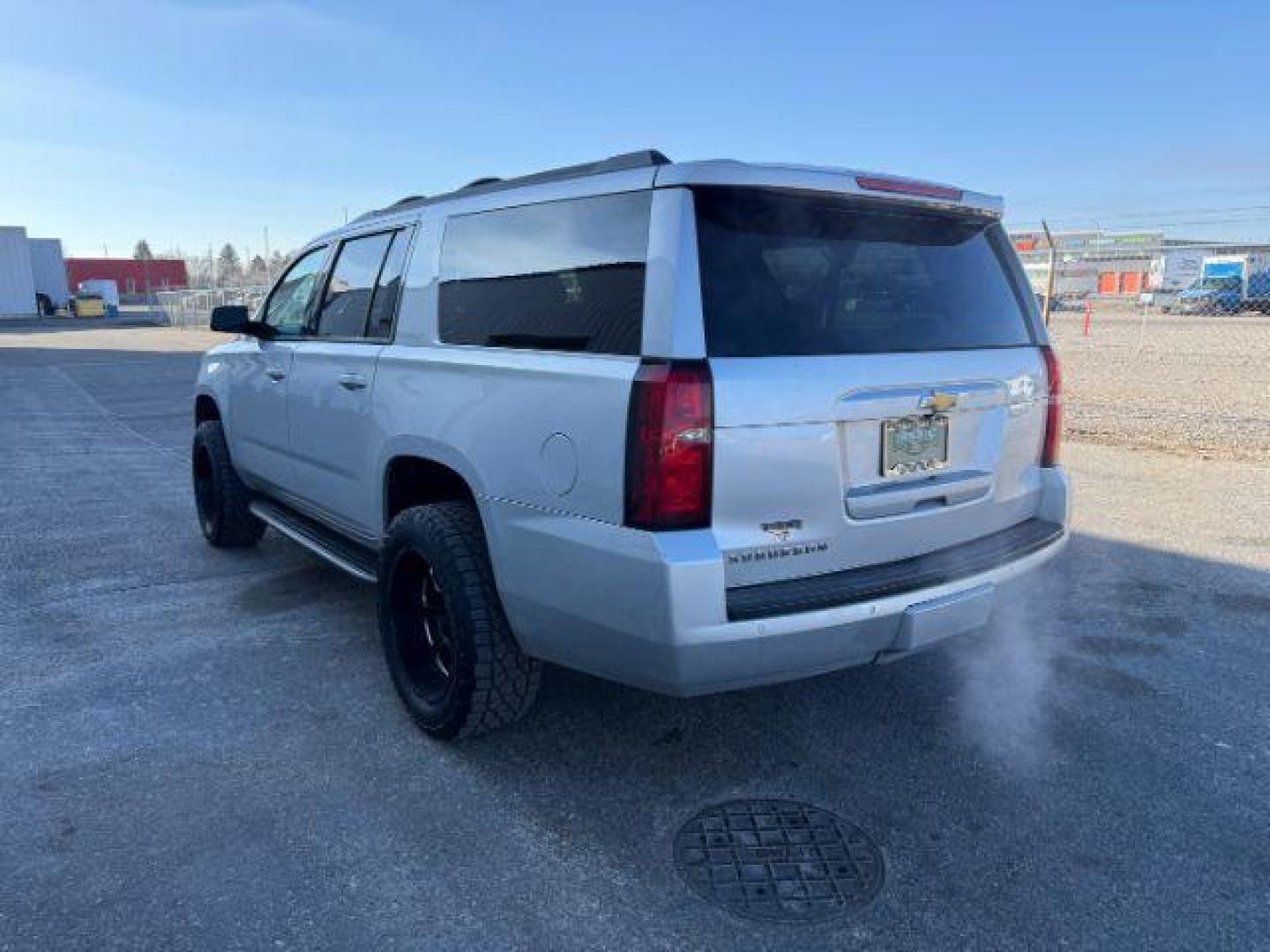 2015 SILVER /Jet Black Chevrolet Suburban 1500 (1GNSKJKC4FR) with an EcoTec3 53L V-8 gasoline direct injection engine, Automatic transmission, located at 1175 N Woodruff Ave, Idaho Falls, ID, 83401, 43.506901, -111.999657 - At Timberline Auto, finding a great deal on your next vehicle is always easy! Our experienced sales staff's goal is to help find you the right vehicle at the right price! Our knowledgeable finance department has options for almost any credit score. We offer extended service contract options to prote - Photo#2