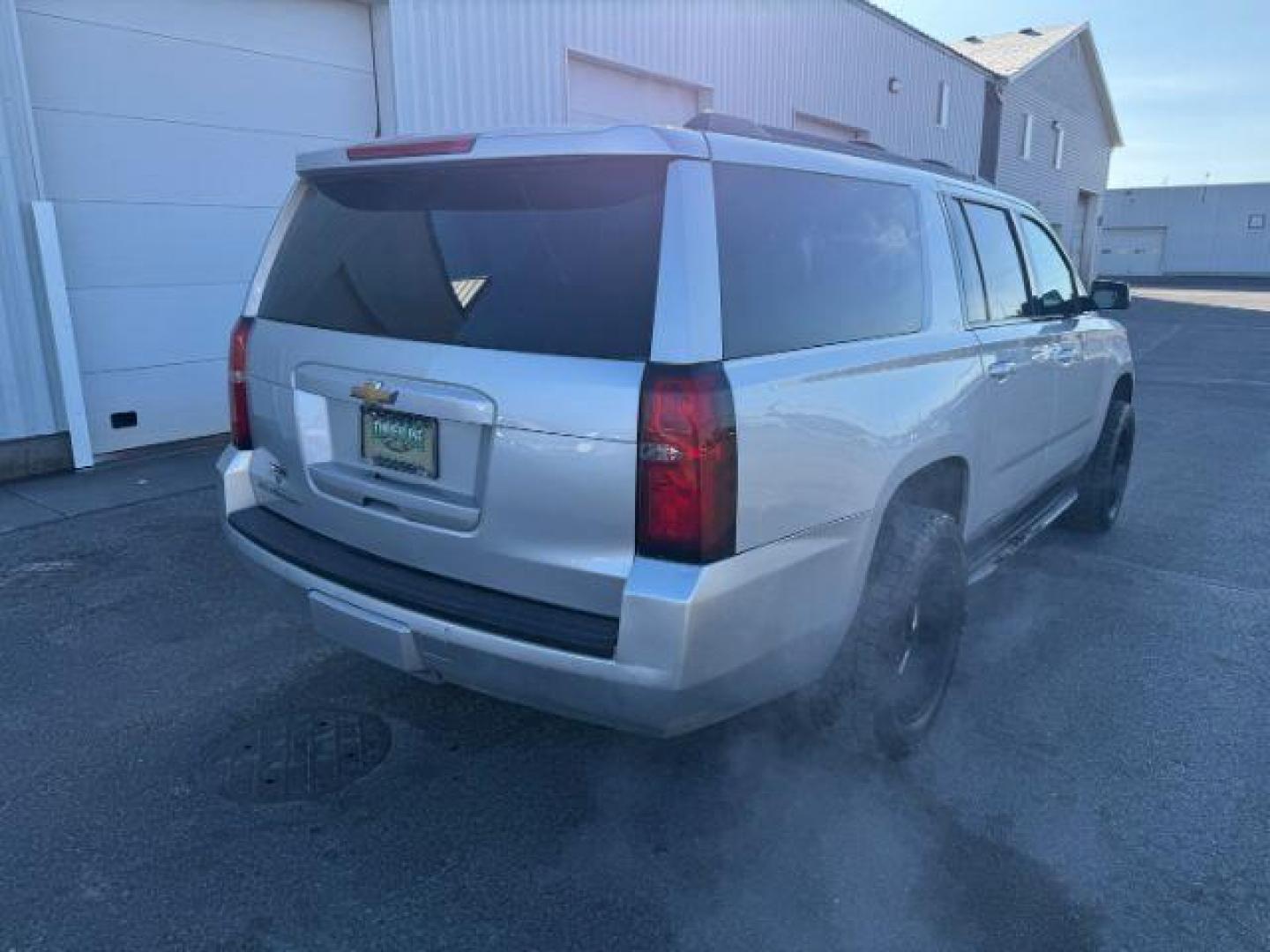 2015 SILVER /Jet Black Chevrolet Suburban 1500 (1GNSKJKC4FR) with an EcoTec3 53L V-8 gasoline direct injection engine, Automatic transmission, located at 1175 N Woodruff Ave, Idaho Falls, ID, 83401, 43.506901, -111.999657 - At Timberline Auto, finding a great deal on your next vehicle is always easy! Our experienced sales staff's goal is to help find you the right vehicle at the right price! Our knowledgeable finance department has options for almost any credit score. We offer extended service contract options to prote - Photo#9