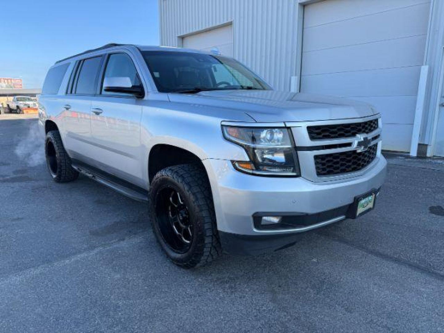 2015 SILVER /Jet Black Chevrolet Suburban 1500 (1GNSKJKC4FR) with an EcoTec3 53L V-8 gasoline direct injection engine, Automatic transmission, located at 1175 N Woodruff Ave, Idaho Falls, ID, 83401, 43.506901, -111.999657 - At Timberline Auto, finding a great deal on your next vehicle is always easy! Our experienced sales staff's goal is to help find you the right vehicle at the right price! Our knowledgeable finance department has options for almost any credit score. We offer extended service contract options to prote - Photo#11