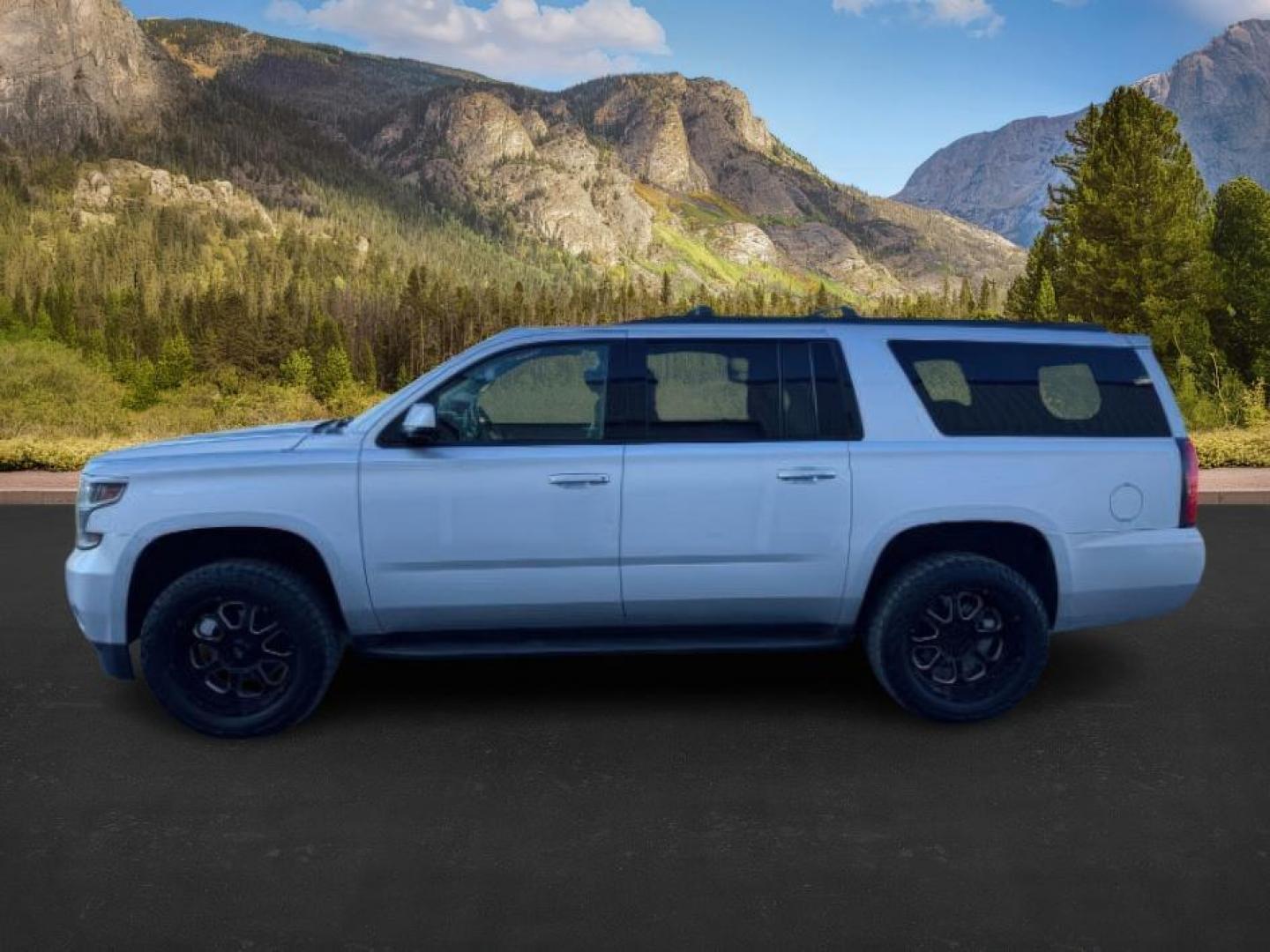 2015 SILVER /Jet Black Chevrolet Suburban 1500 (1GNSKJKC4FR) with an EcoTec3 53L V-8 gasoline direct injection engine, Automatic transmission, located at 1175 N Woodruff Ave, Idaho Falls, ID, 83401, 43.506901, -111.999657 - At Timberline Auto, finding a great deal on your next vehicle is always easy! Our experienced sales staff's goal is to help find you the right vehicle at the right price! Our knowledgeable finance department has options for almost any credit score. We offer extended service contract options to prote - Photo#1