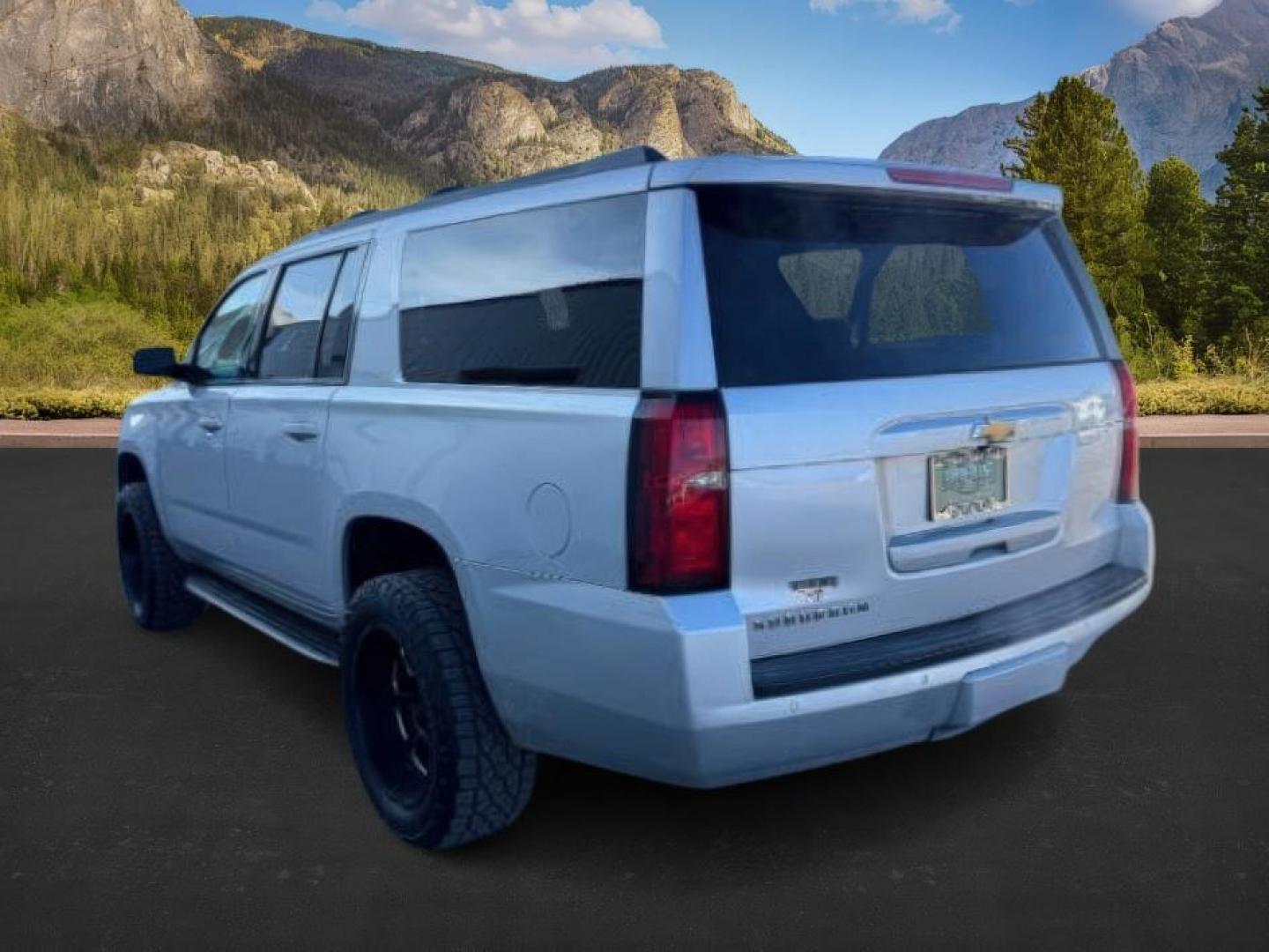2015 SILVER /Jet Black Chevrolet Suburban 1500 (1GNSKJKC4FR) with an EcoTec3 53L V-8 gasoline direct injection engine, Automatic transmission, located at 1175 N Woodruff Ave, Idaho Falls, ID, 83401, 43.506901, -111.999657 - At Timberline Auto, finding a great deal on your next vehicle is always easy! Our experienced sales staff's goal is to help find you the right vehicle at the right price! Our knowledgeable finance department has options for almost any credit score. We offer extended service contract options to prote - Photo#2