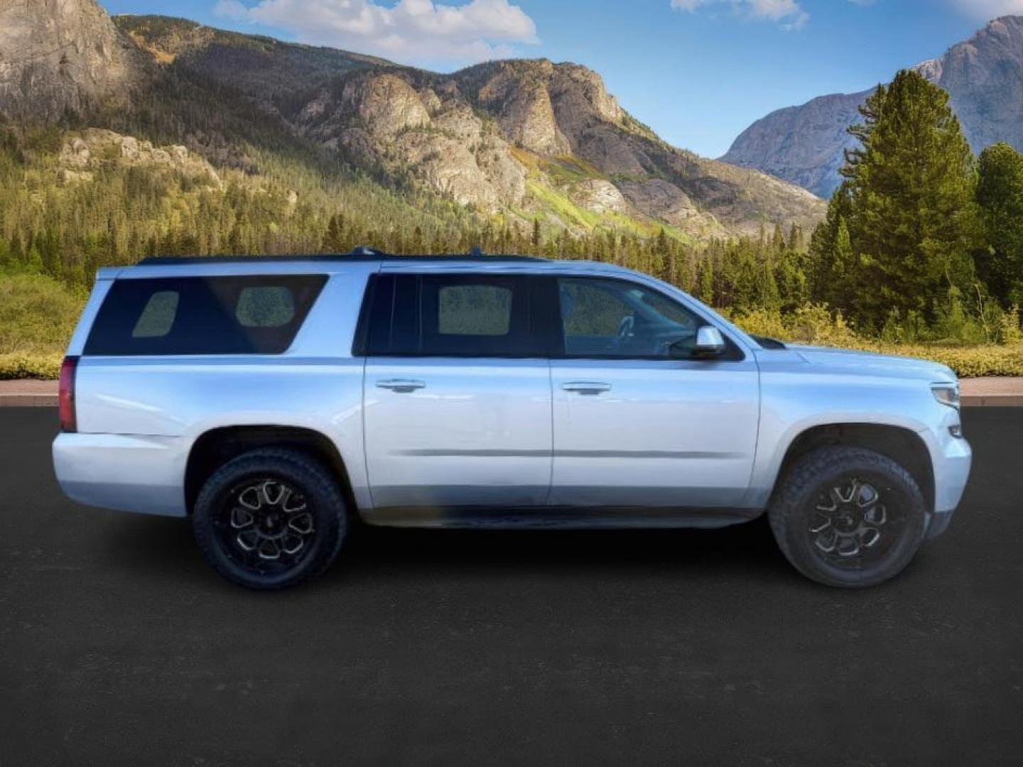 2015 SILVER /Jet Black Chevrolet Suburban 1500 (1GNSKJKC4FR) with an EcoTec3 53L V-8 gasoline direct injection engine, Automatic transmission, located at 1175 N Woodruff Ave, Idaho Falls, ID, 83401, 43.506901, -111.999657 - At Timberline Auto, finding a great deal on your next vehicle is always easy! Our experienced sales staff's goal is to help find you the right vehicle at the right price! Our knowledgeable finance department has options for almost any credit score. We offer extended service contract options to prote - Photo#10